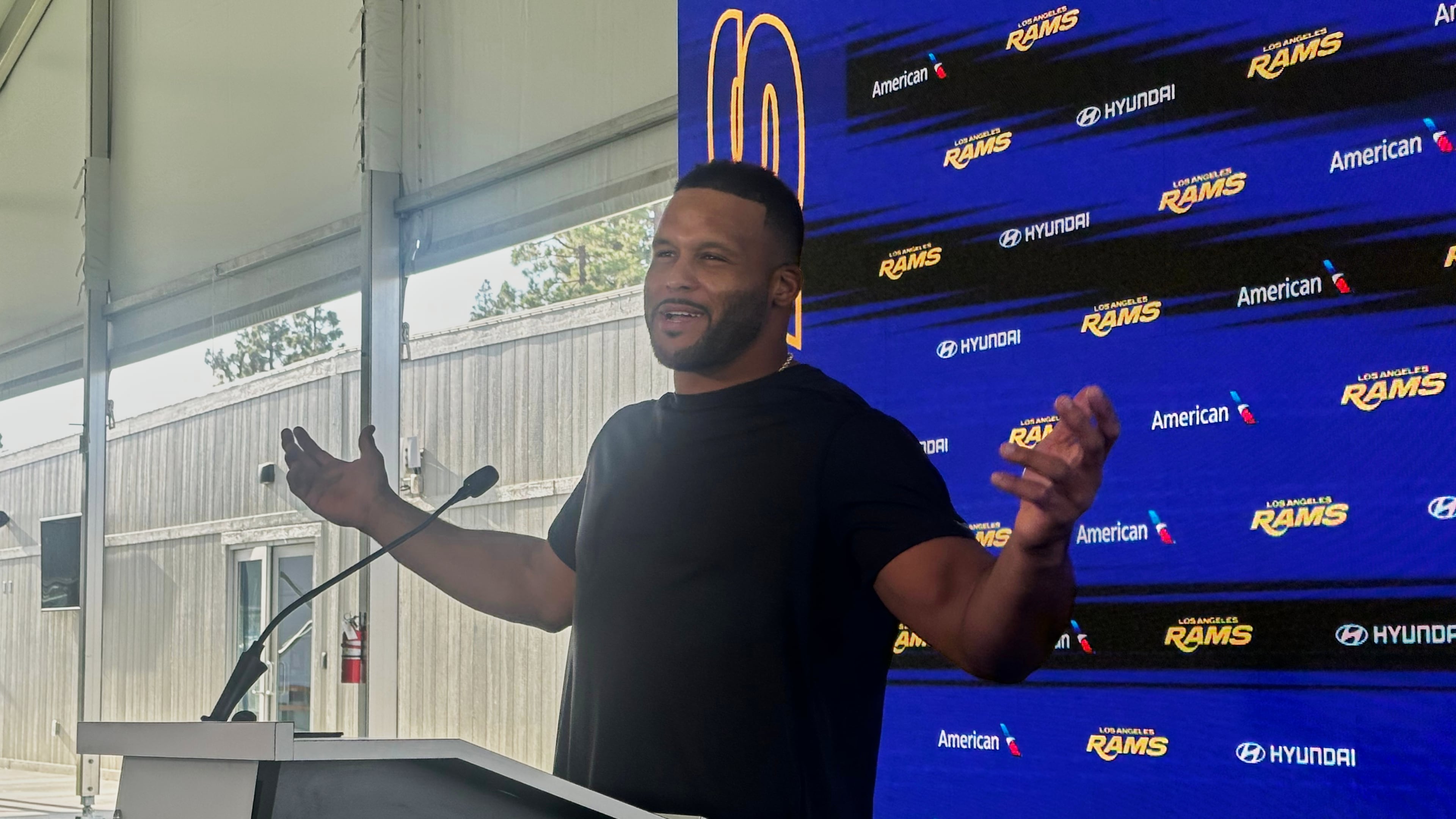Aaron Donald speaks to the media at the Los Angeles Rams' training complex in Los Angeles, Sunday, Aug. 30, 2026. (AP Photo/Greg Beacham)