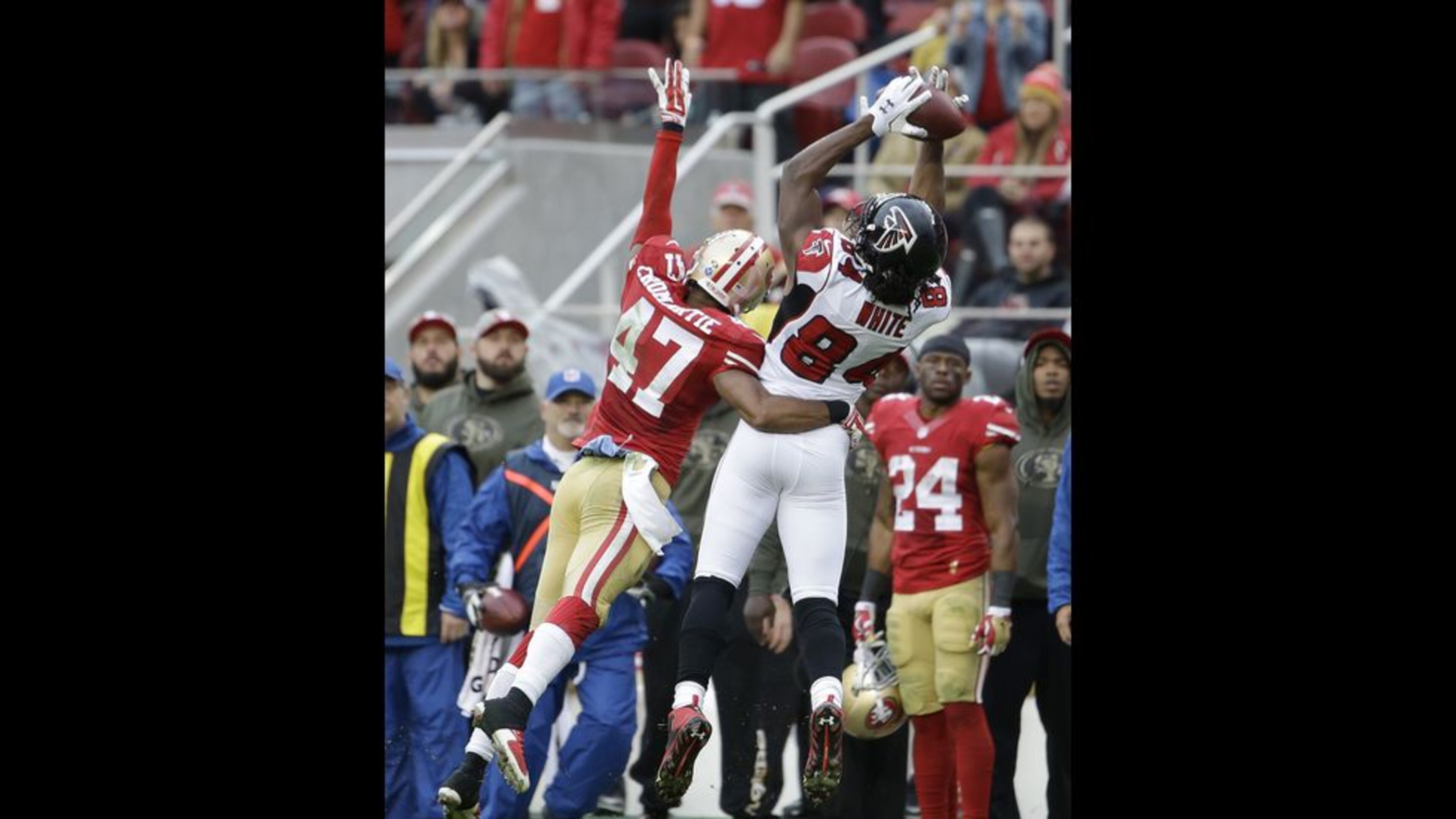 Atlanta Falcons wide receiver Roddy White (84) cannot catch a pass while defended by San Francisco 49ers defensive back Marcus Cromartie (47) during the second half of an NFL football game in Santa Clara, Calif., Sunday, Nov. 8, 2015. (AP Photo/Marcio Jose Sanchez)