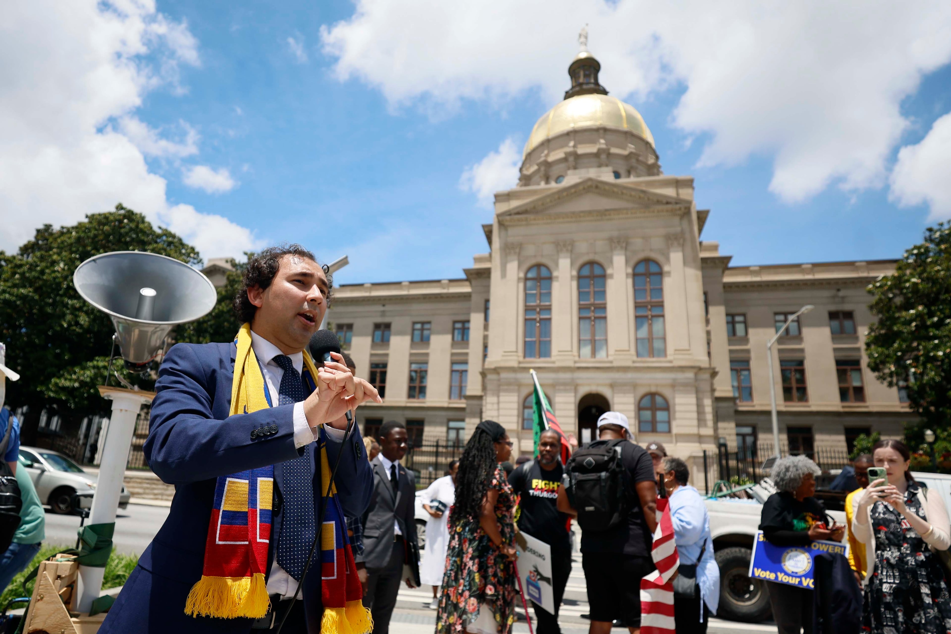 Georgia State Rep. Gabriel Sanchez, D-Smyrna, speaks to participants at a rally outside the State Capitol after announcing that Georgia Republican leaders will not redraw the state’s political maps during a special legislative session on Wednesday, June 17, 2026.
(Miguel Martinez/AJC)