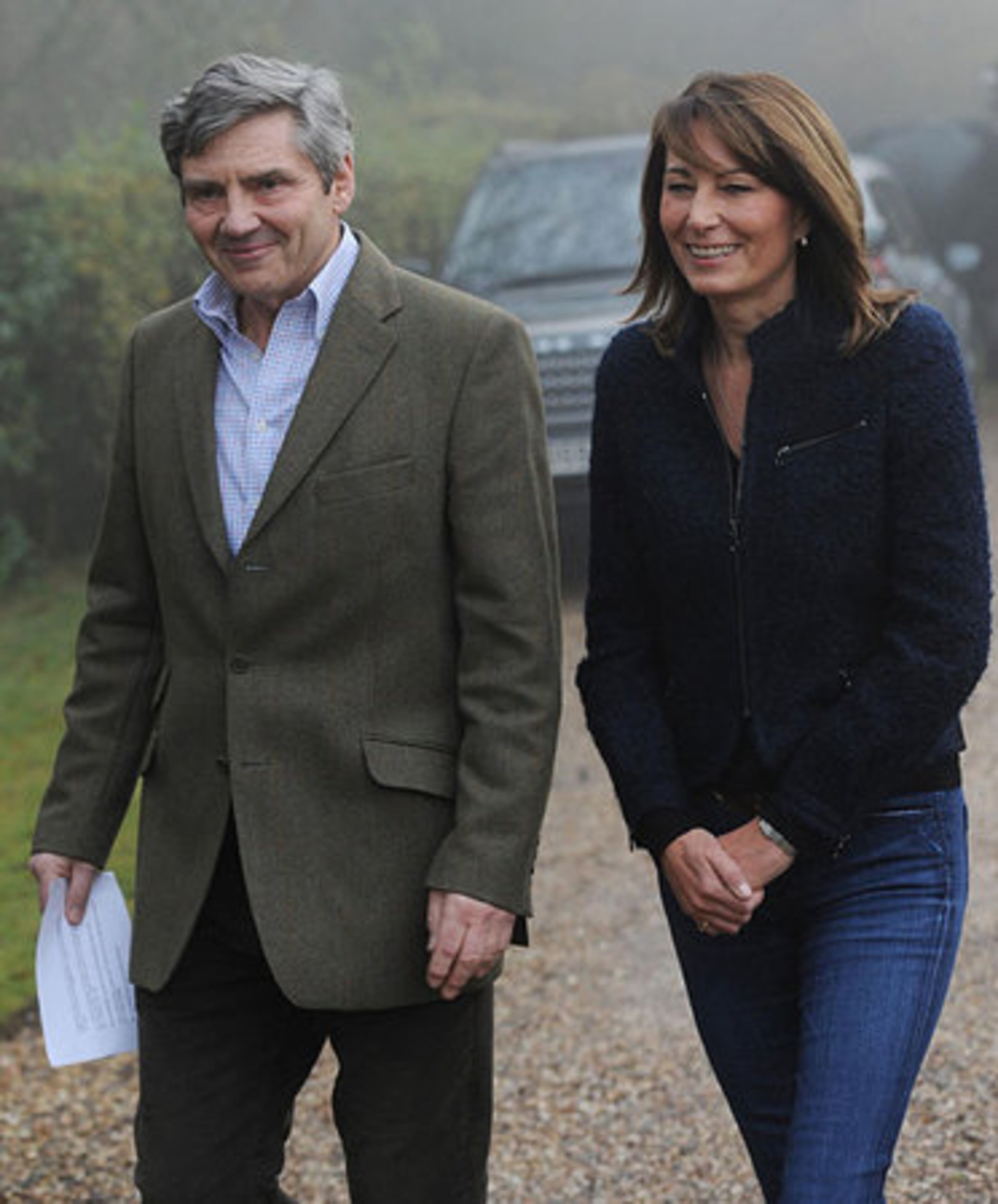 Michael and Carole Middleton, the parents of Kate Middleton, make a statement on the engagement of their daughter to Britain's Prince William, outside their home near the village of Bucklebury, England, Tuesday Nov. 16, 2010. Royal officials announced that Prince William, who is second in line to the throne, and Middleton will marry next spring or summer in London.