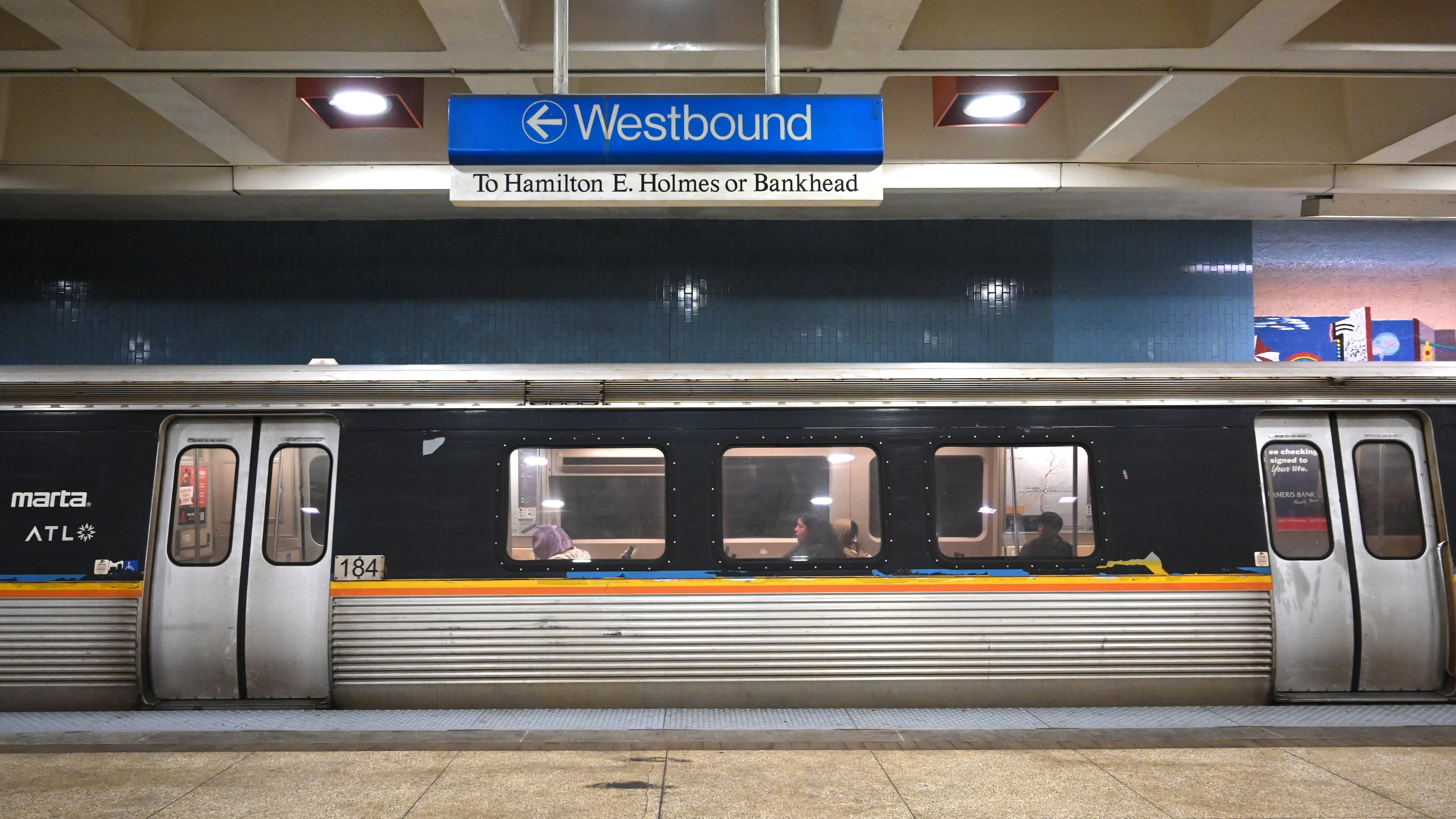 Peeling paint is visible on the exterior of the train at Ashby station on Friday, Feb. 20, 2026, in Atlanta. (Hyosub Shin/AJC)
