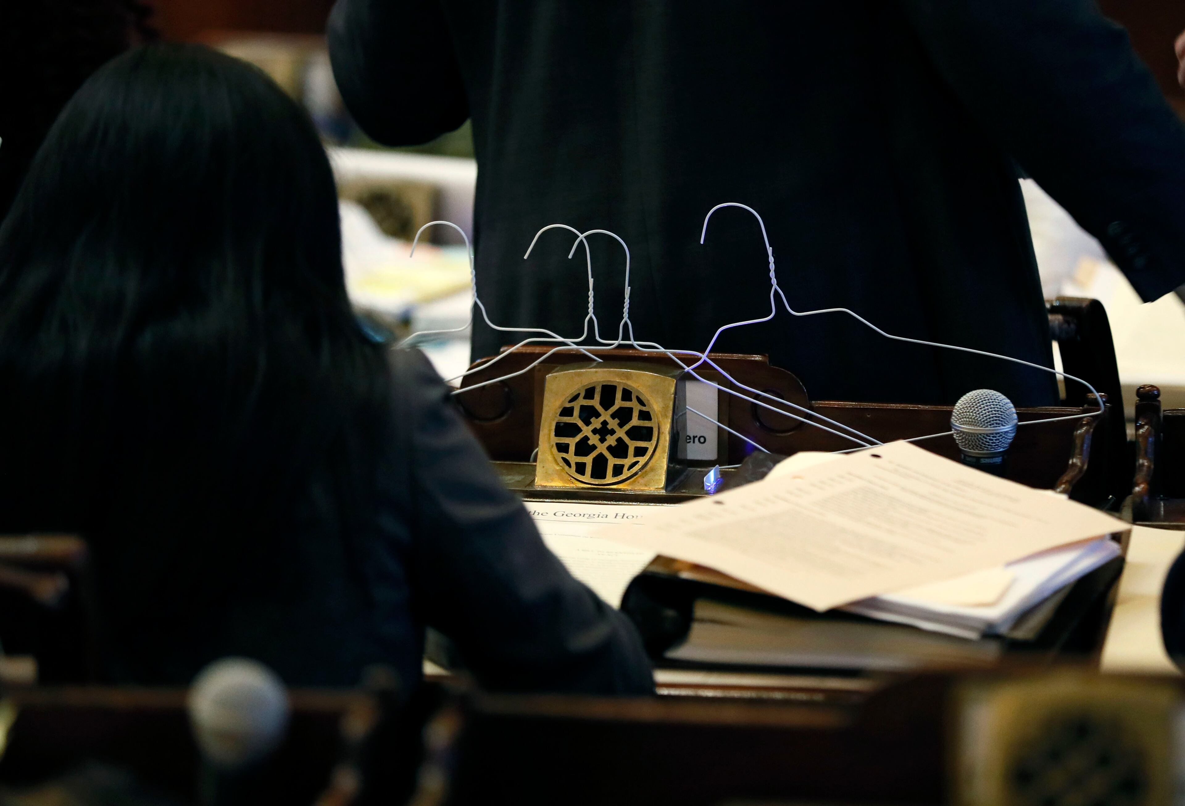 March 7, 2019 - Atlanta - Several woman legislators, including Rep. Brenda Lopez Romero (left), D - Norcross, brought coat hangers into the house to show opposition to HB 481, which would toughen restrictions on abortions. The legislature was in session for "crossover" day, the 28th day of the 2019 General Assembly. Bob Andres / bandres@ajc.com