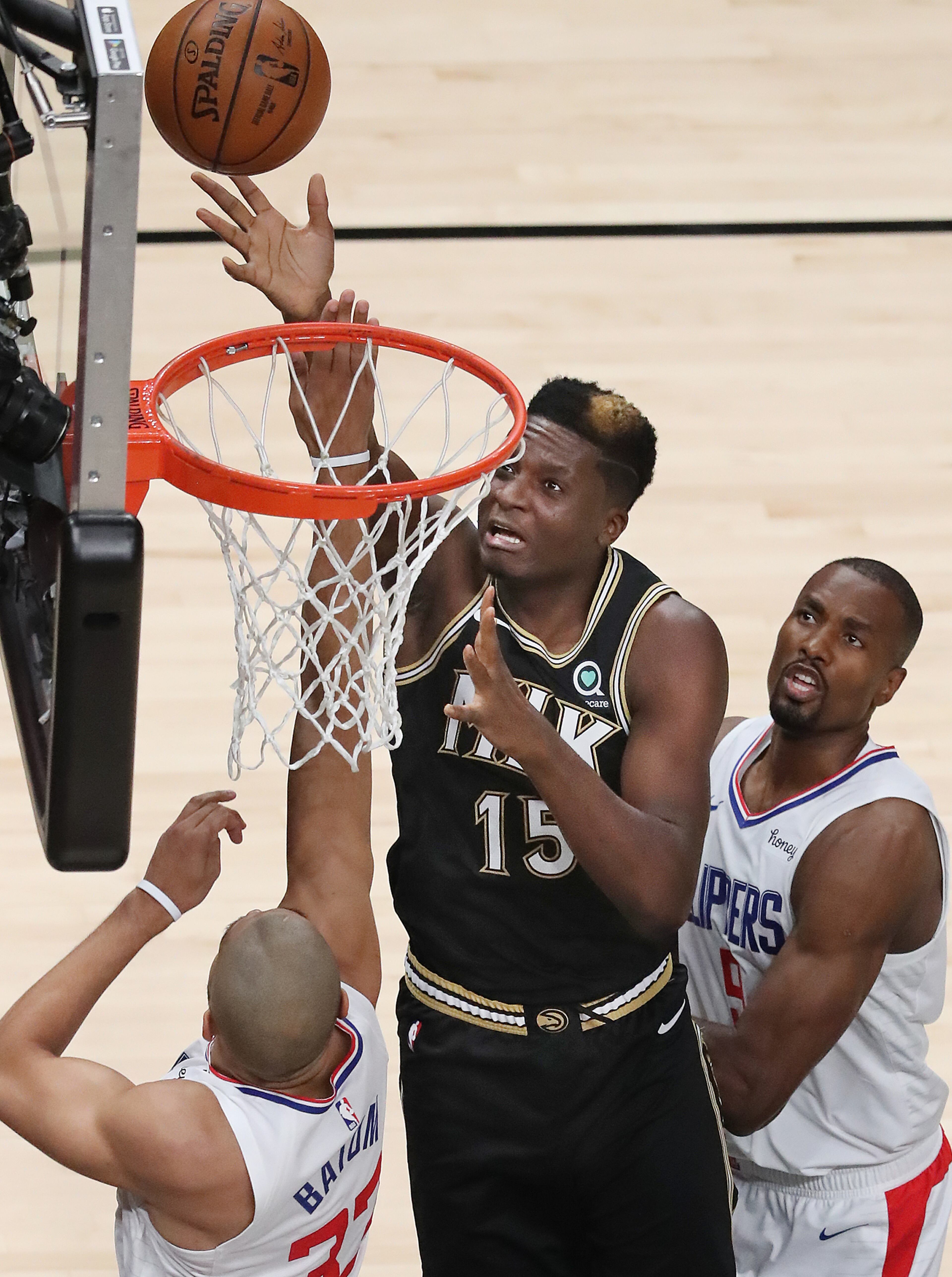 Hawks center Clint Capela gets the offensive rebound for two points against the Los Angeles Clippers in an NBA basketball game on Tuesday, Jan. 26, 2021, in Atlanta. Curtis Compton / Curtis.Compton@ajc.com”