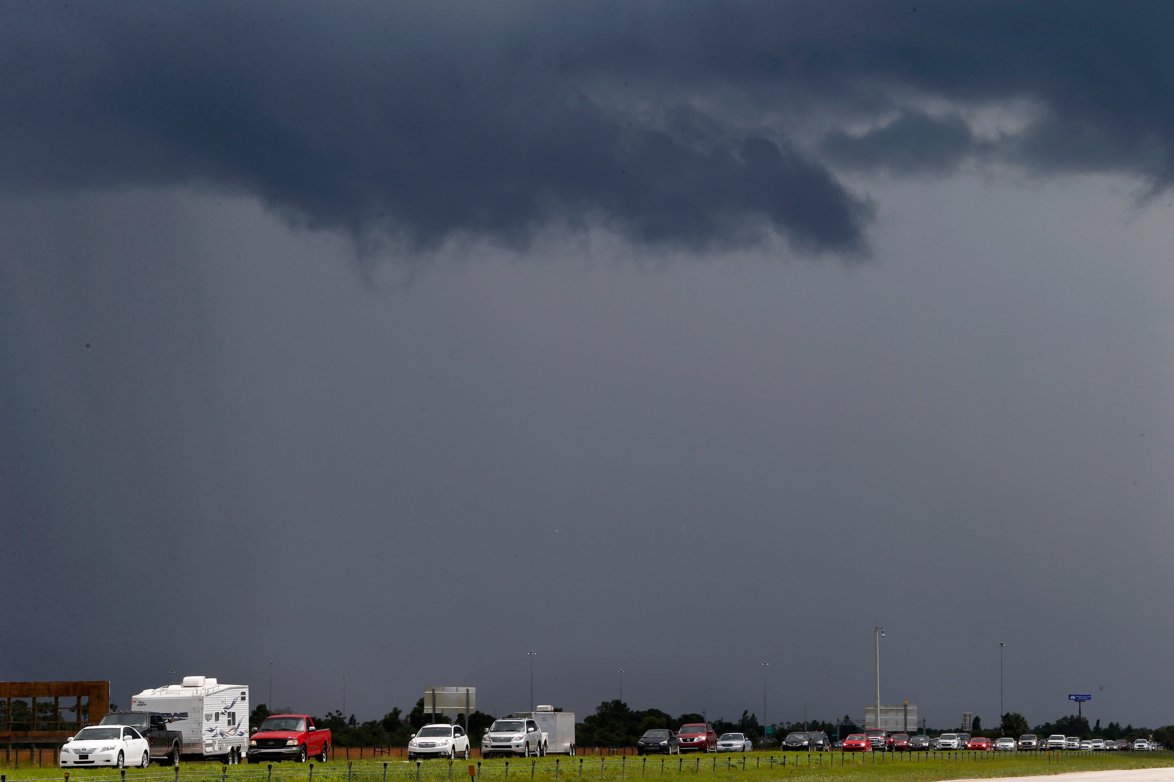 PUNTA GORDA, FL - SEPTEMBER 08: Traffic on Interstate 75 while moving in both directions, was noticeably heavier in the northbound lanes as residents and visitors in Florida evacuate the area ahead of Hurricane Irma on September 08, 2017 in Punta Gorda, Florida. Florida appears to be in the path of the hurricane which may come ashore at category 4. (Photo by Brian Blanco/Getty Images)