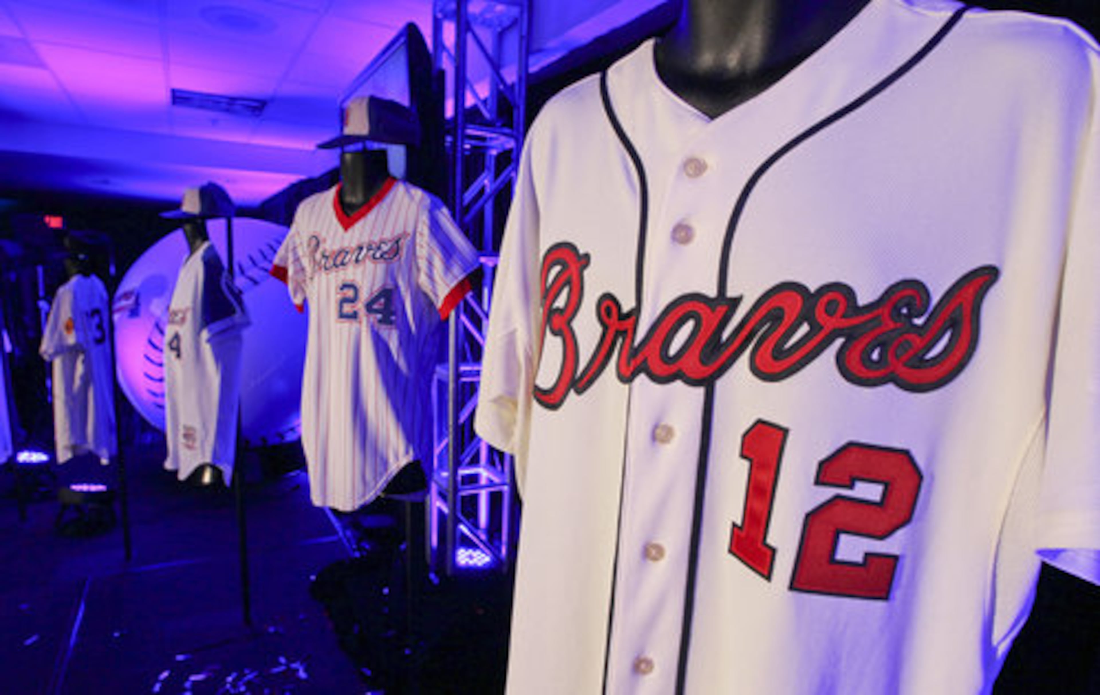 The Atlanta Braves introduced a new alternative home uniform at the 755 Club at Turner Field Monday, Feb. 6, 2012 reflecting the look of the 1966 team. The cream colored uniforms features the traditional Braves script in red across the chest minus the tomahawk, red numbers on the front and back, navy piping, navy player letters and a new logo patch on the left sleeve. The logo patch has two criss-crossing tomahawks, the year "1876" - the franchise's first season - and the words "Atlanta Braves."