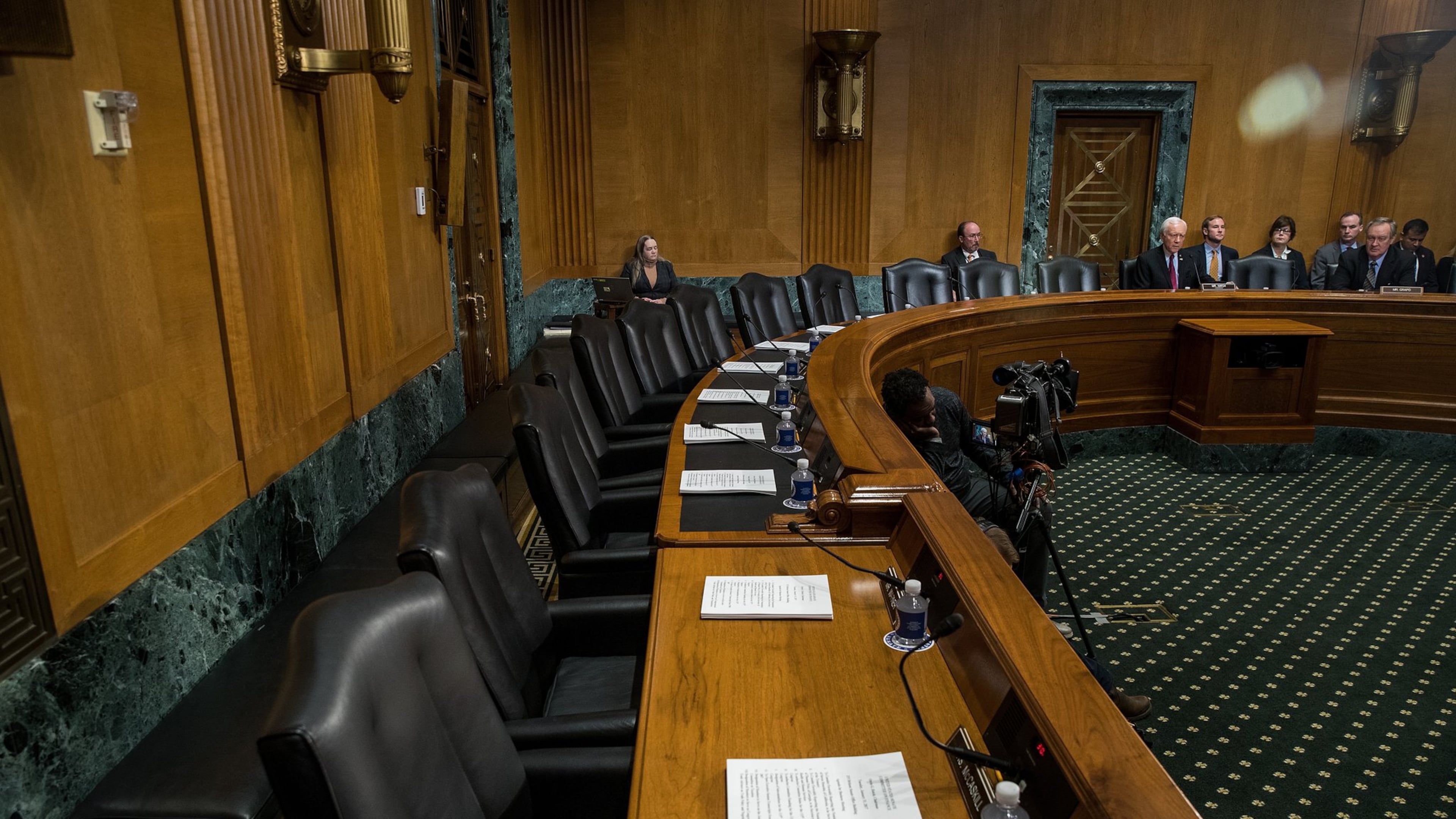 A view of empty Democrat seats during a meeting Tuesday of the Senate Finance Committee to vote on the nominations of Cabinet nominees Tom Price and Steve Mnuchin. Senate Democrats on the committee did not show up for the meeting and are boycotting Mnuchin and Price committee votes. (Photo by Drew Angerer/Getty Images)