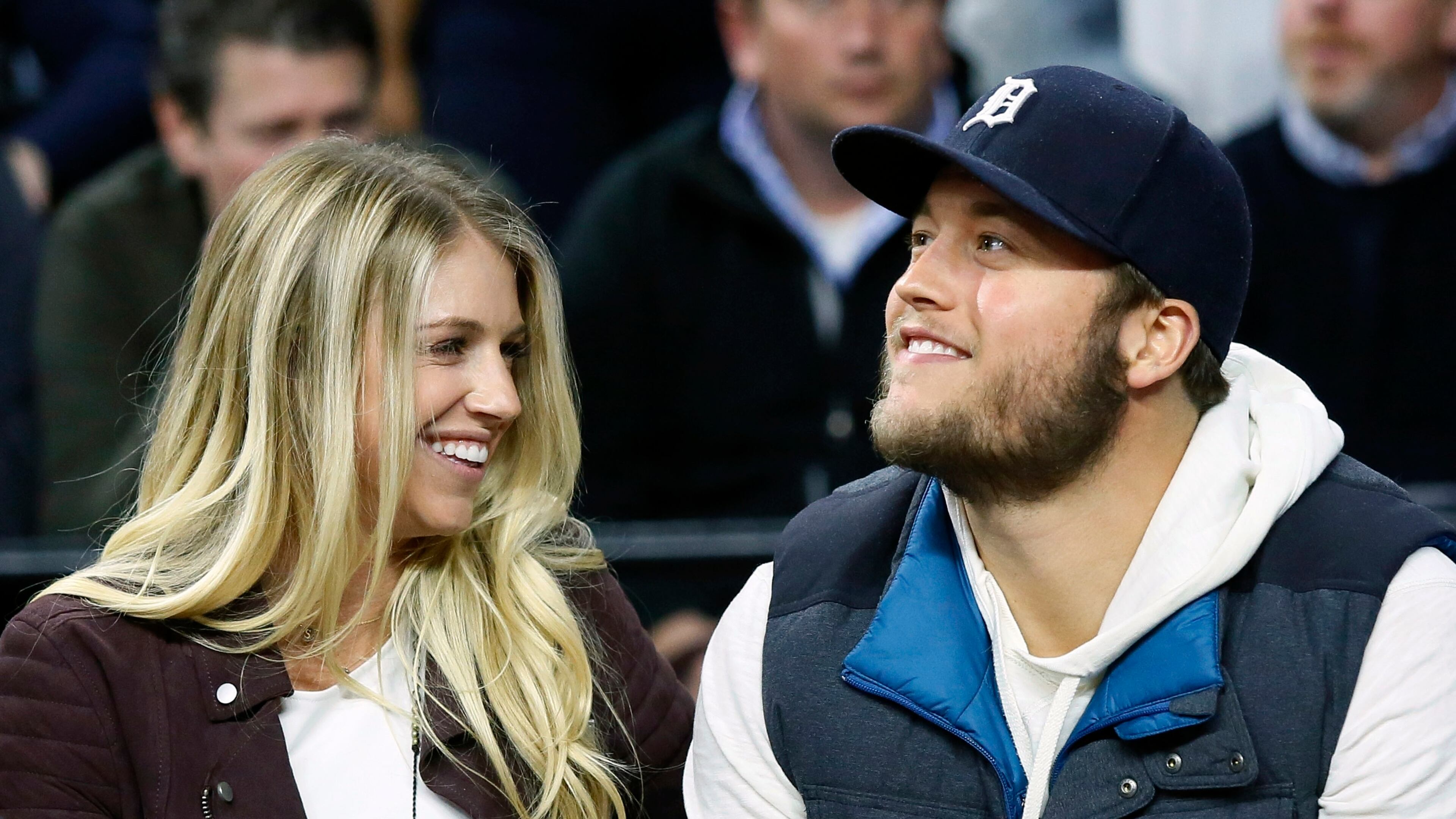 Lions quarterback Matthew Stafford and his wife Kelly watch an NBA game in 2015. (AP Photo/Duane Burleson, File)