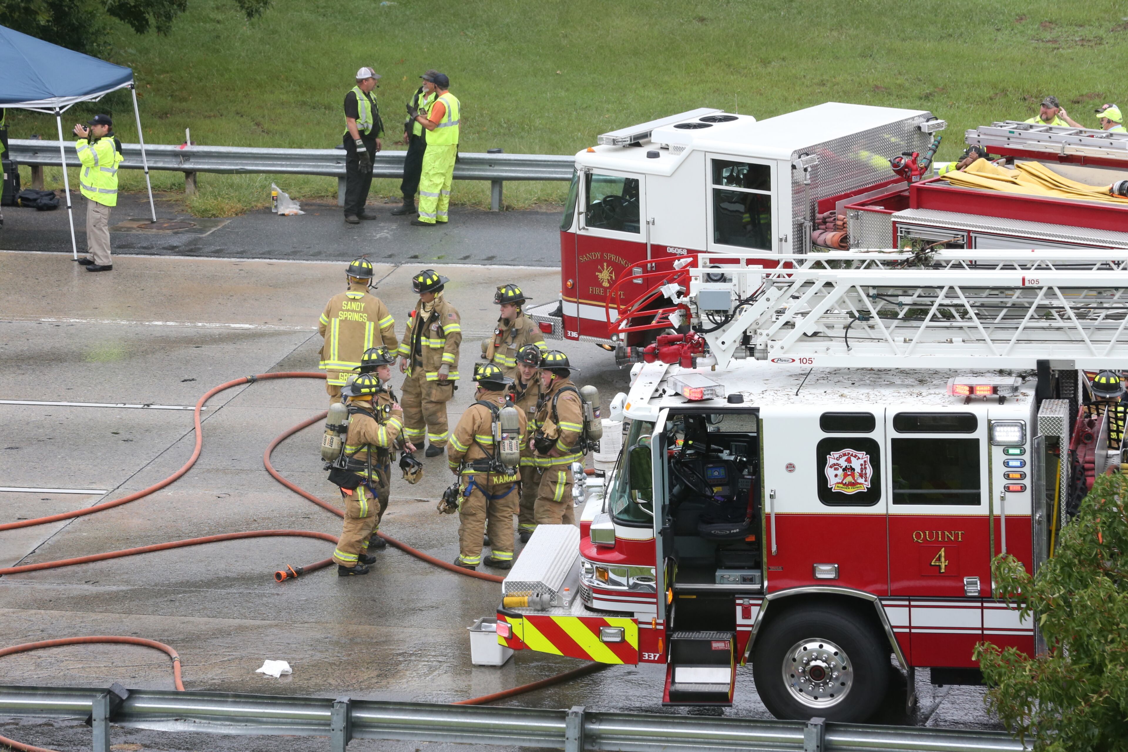 Two tractor-trailers plunged off I-285 onto Ga. 400, shutting down all northbound lanes of 400 and eastbound lanes of 285 during the Friday afternoon lunch hour. No injuries reported.