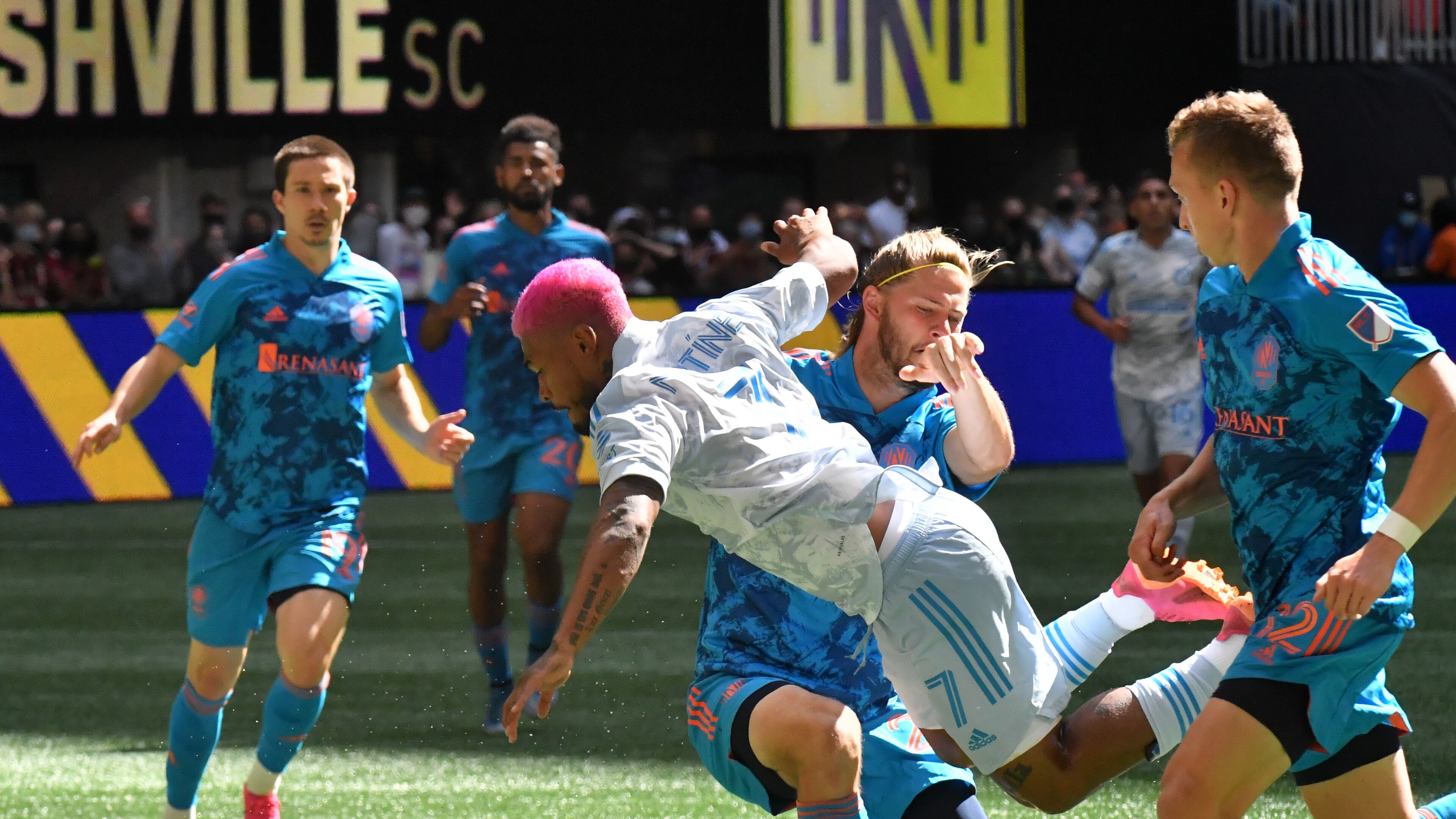 May 29, 2021 Atlanta - Atlanta United forward Josef Martinez (7) collides with Nashville SC defender Walker Zimmerman (25) as he works with the ball during the second half in a MLS soccer match at Mercedes-Benz Stadium in Atlanta on Saturday, May 29, 2021. The game ended with 2-2. (Hyosub Shin / Hyosub.Shin@ajc.com)