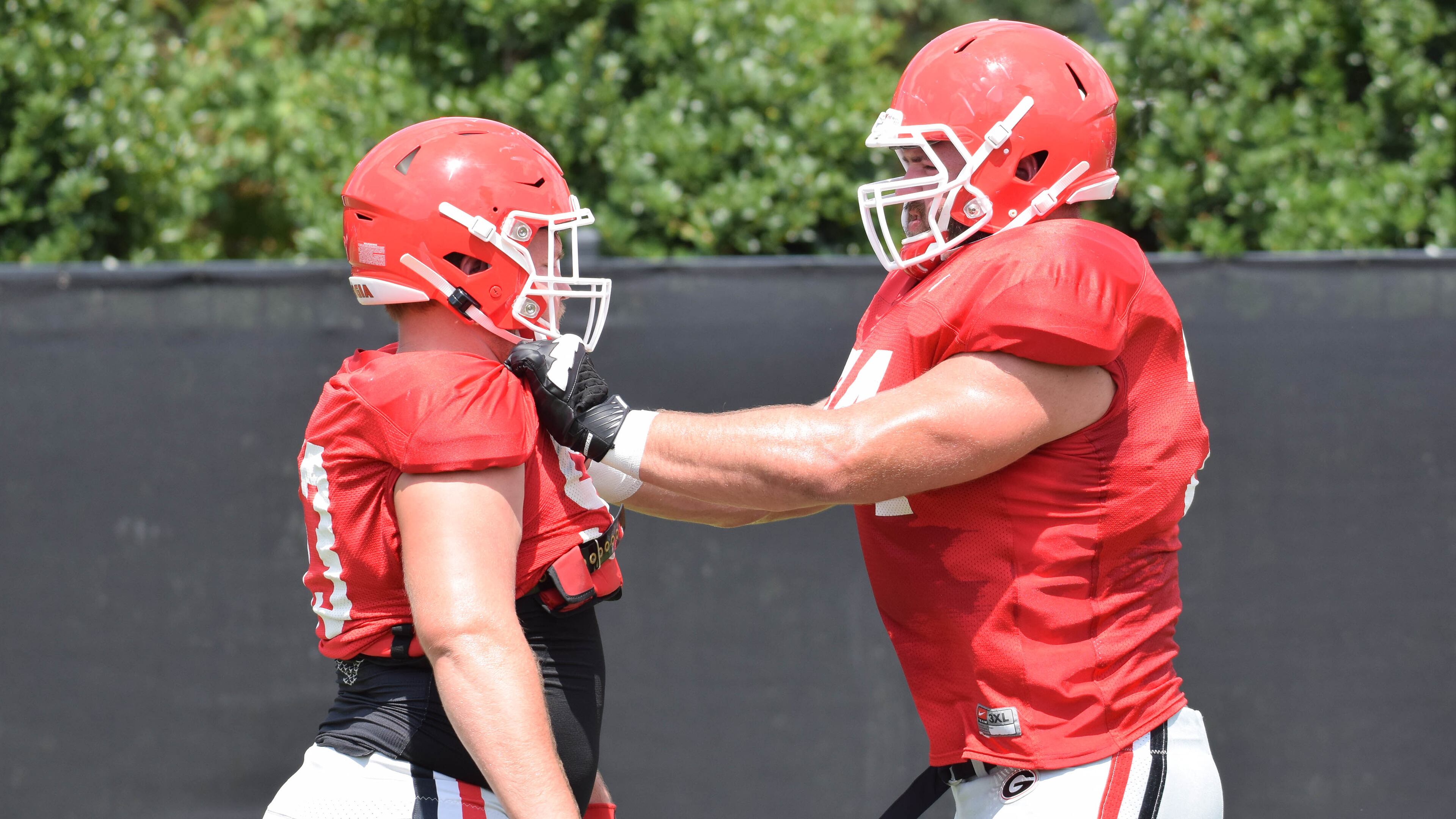 Georgia offensive lineman Ben Cleveland (74) works on his hand positioning during the Bulldogs' practice Tuesday, Aug. 6, 2019, on the Woodruff Practice Fields in Athens.