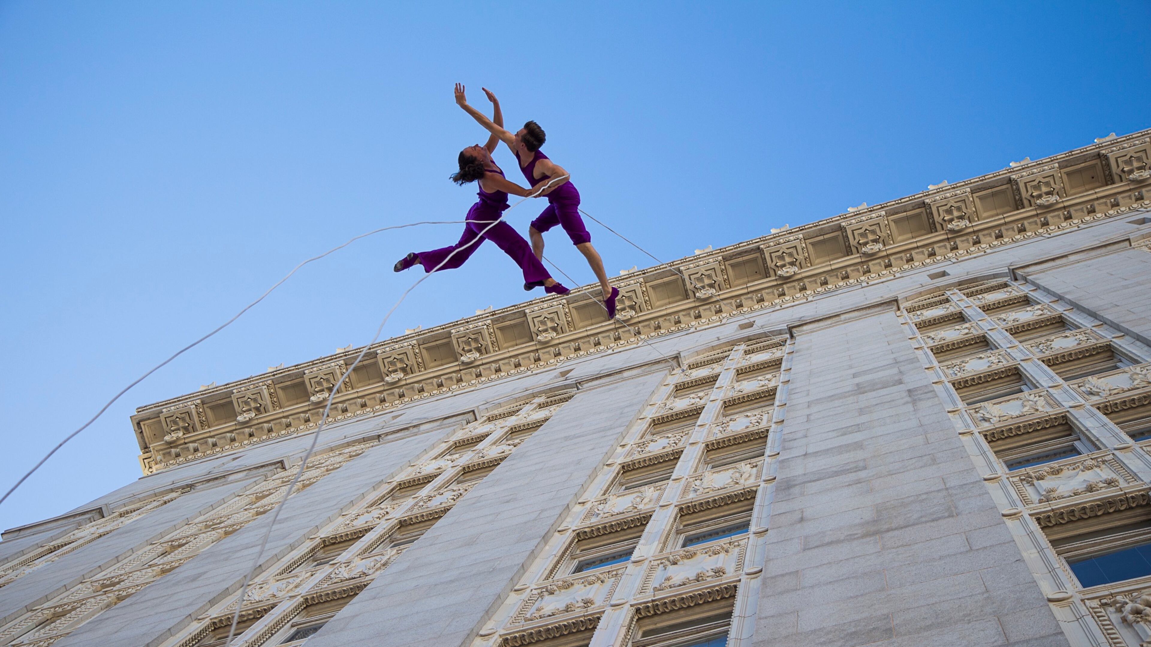 "Field" brings together a collective of performing artists, regenerative textile artists, a sustainability strategist and creative riggers to transform an urban wall into a performance space.