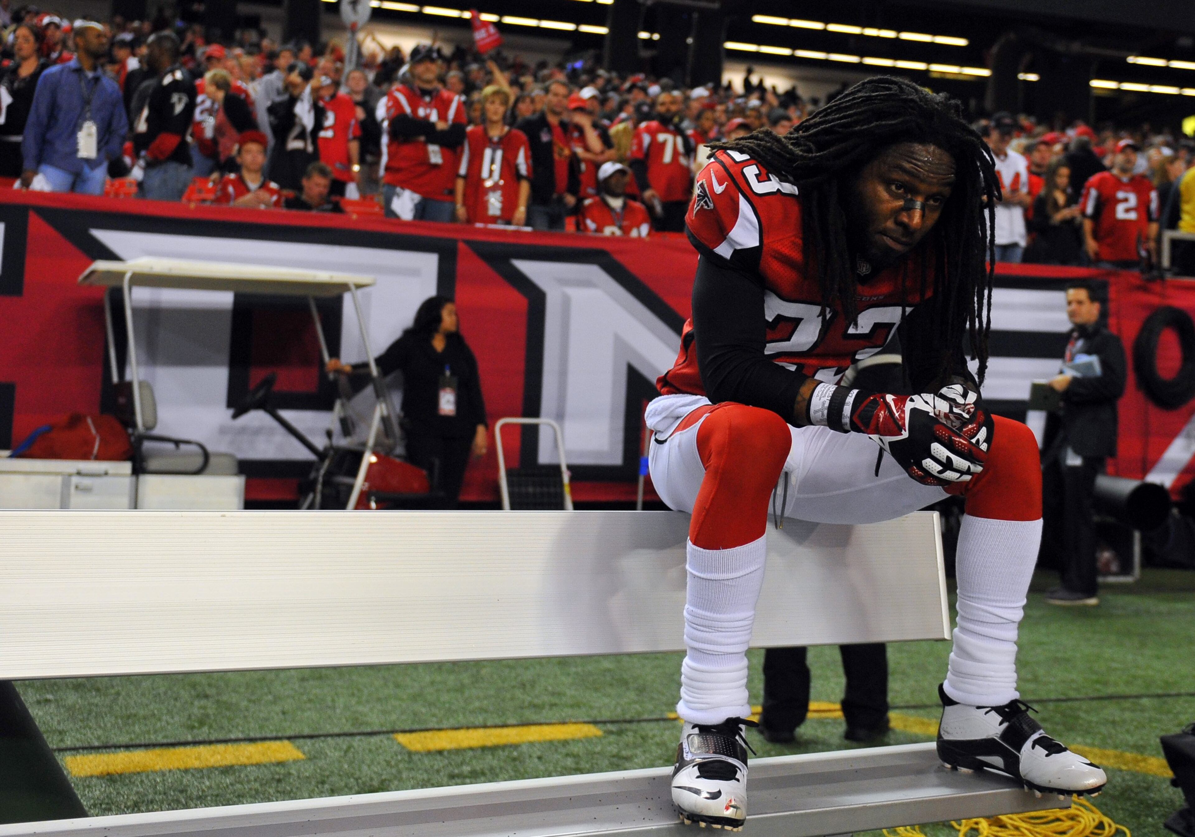 Falcons cornerback Dunta Robinson sits alone on the bench after the Falcons' loss to the 49ers in the NFC championship game Sunday afternoon Jan. 20, 2013 at the Georgia Dome. BRANT SANDERLIN / BSANDERLIN@AJC.COM