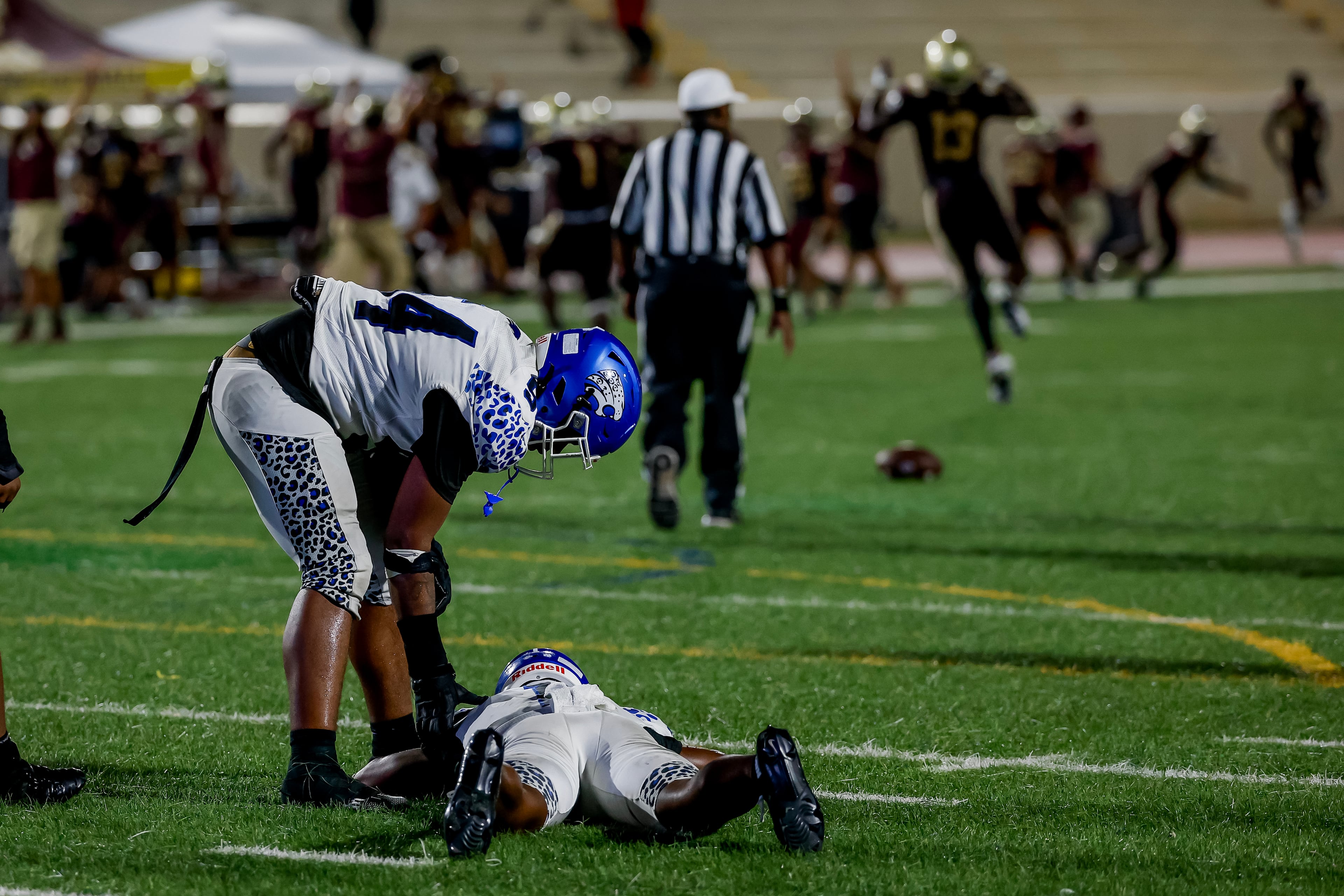 Stephenson quarterback Zabrian Boler (right) is consoled by offensive lineman Brintson Mitchell after fumbling the ball against Tucker during their game at Hallford Stadium on Friday, Sept. 4, 2026, in Clarkston. (Erik S. Lesser for the AJC)