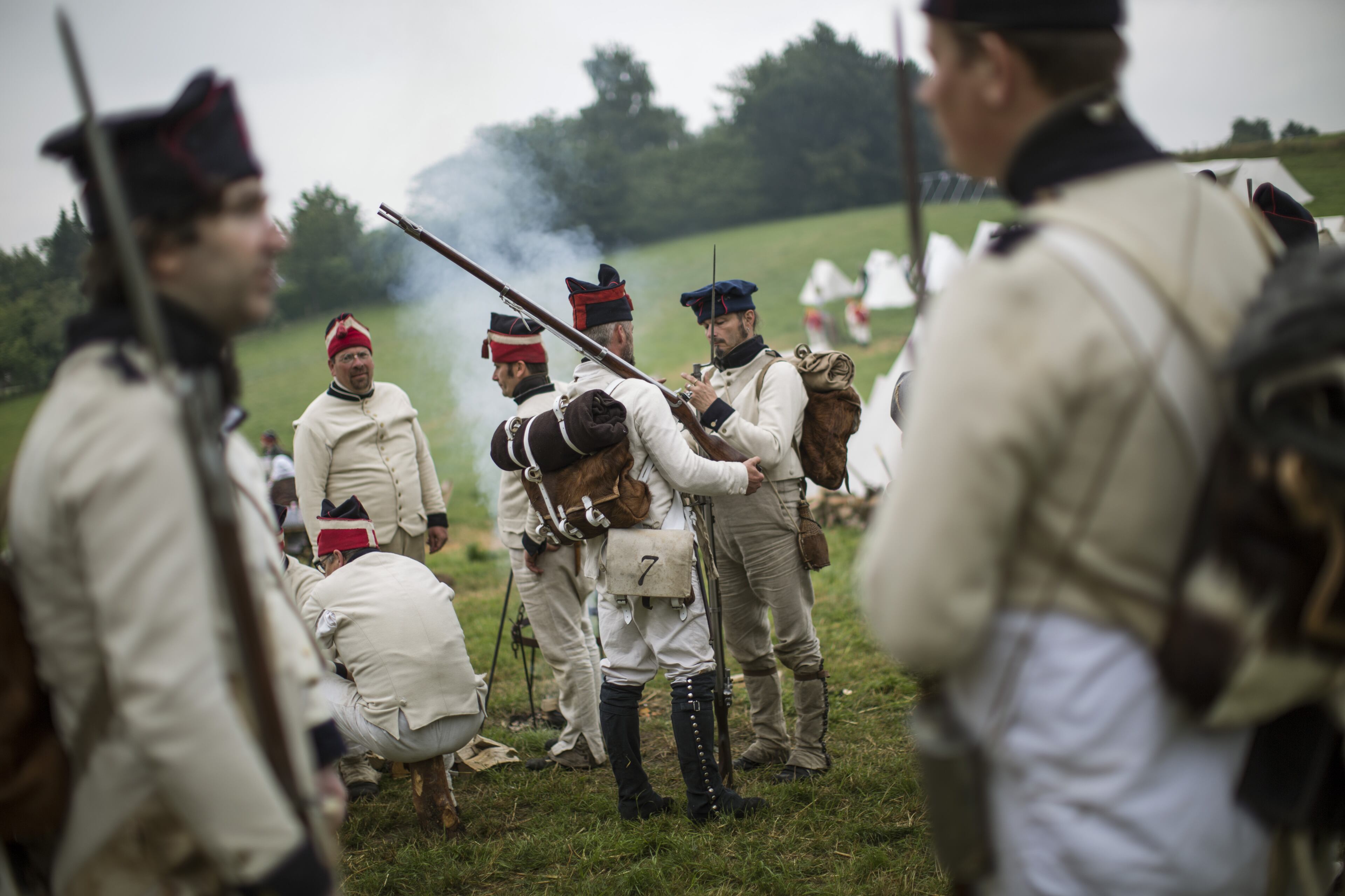 WATERLOO, BELGIUM - JUNE 18: Historical re-enactors take part in a practice drills in the French Bivouac camp on June 18, 2015 in Waterloo, Belgium. Around 5000 historical re-enactors from around the world will take part in three days of events from June 18, 2015 to mark the 200th anniversary of the Battle of Waterloo. The 1815 battle saw the overthrow of Napoleon Bonaparte and the restoration of Louis XVIII to the French throne. (Photo by Dan Kitwood/Getty Images)