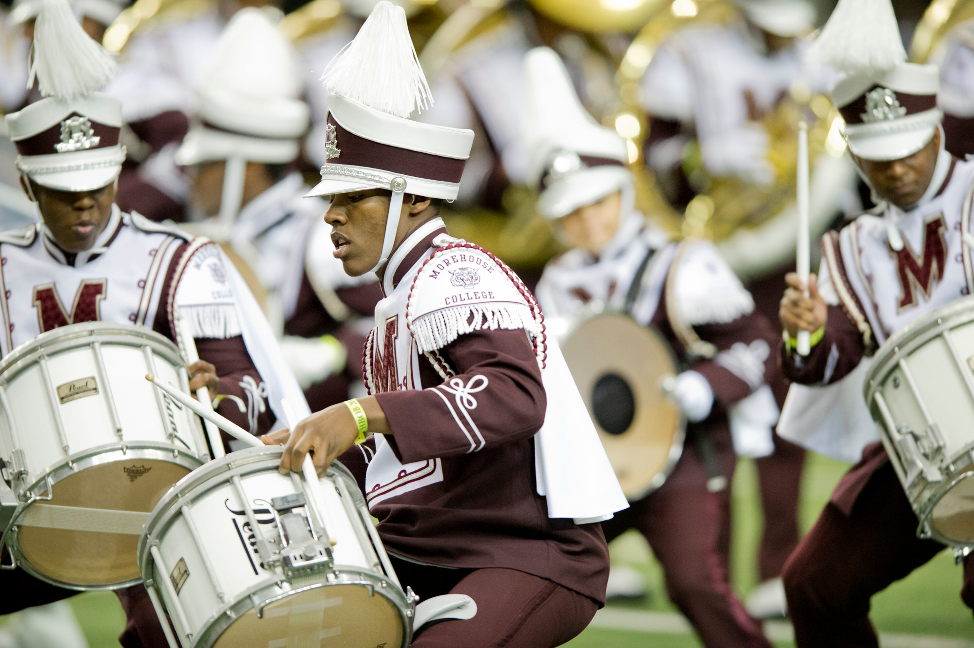 Morehouse College's Jordan Rogers (center) marches while playing the snare drum during the 2014 Honda Battle of the Bands at the Georgia Dome in Atlanta on Jan. 25, 2014.