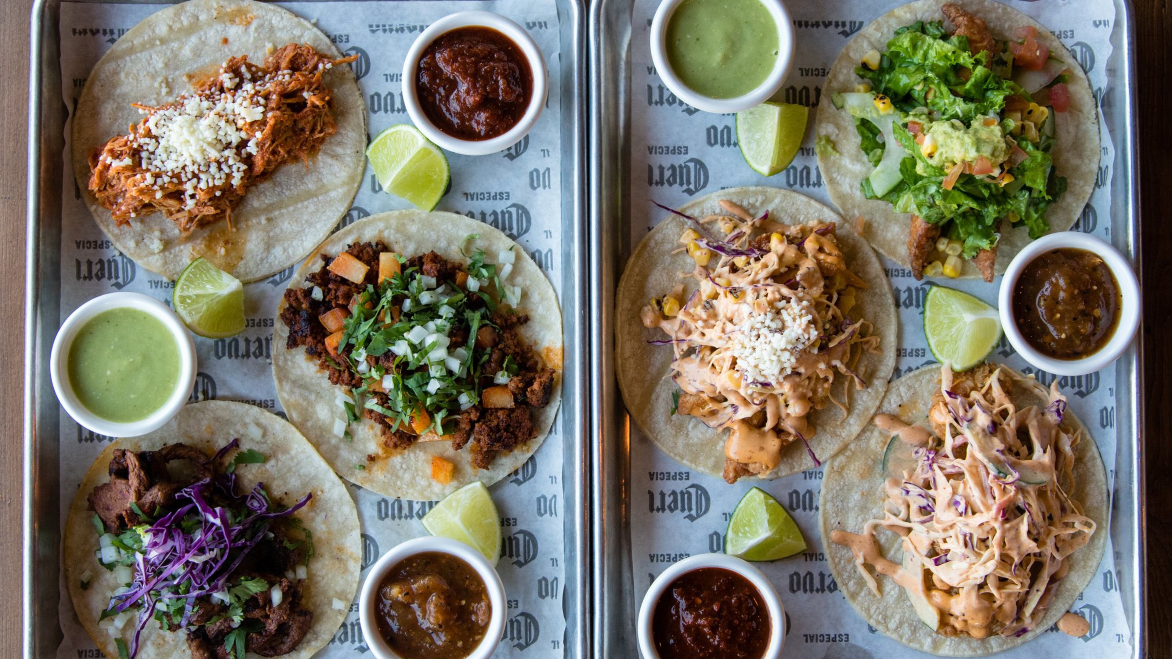 Tacos at Taco Cantina in Old Fourth Ward include (left tray, from top) la tinga de pollo, chorizo cantina and la carne asada; (right tray, from top) pescado frito (fried fish), camaron frito (fried shrimp) and fried chicken. CONTRIBUTED BY HENRI HOLLIS
