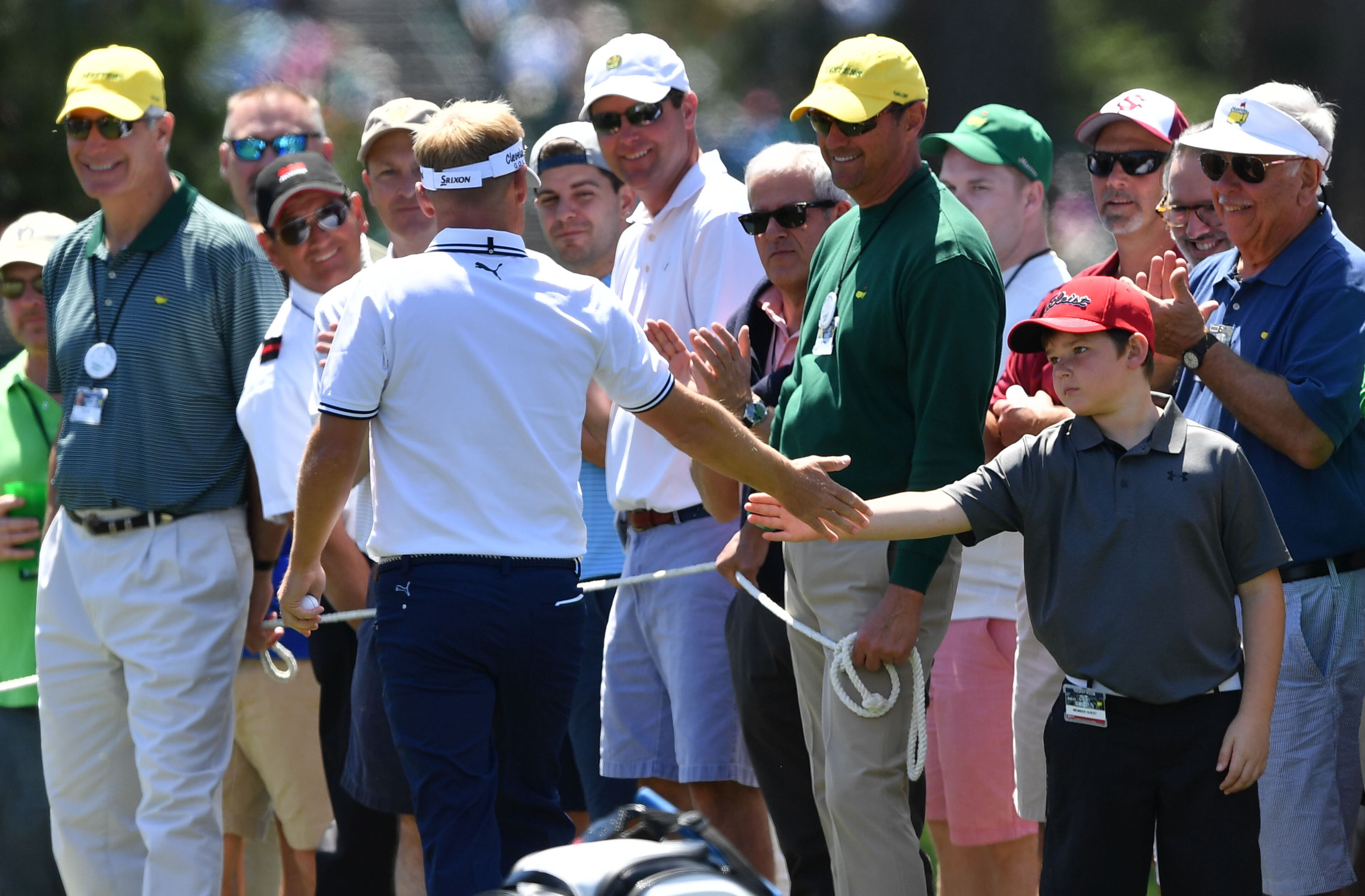 April 8, 2017 AUGUSTA Soren Kjeldsen gives a low five to a fan in the gallery on the 2nd hole. Play begins in the third round of the 81st Masters tournament at the Augusta National Golf Club, Saturday, April 8, 2017. BRANT SANDERLIN / SPECIAL