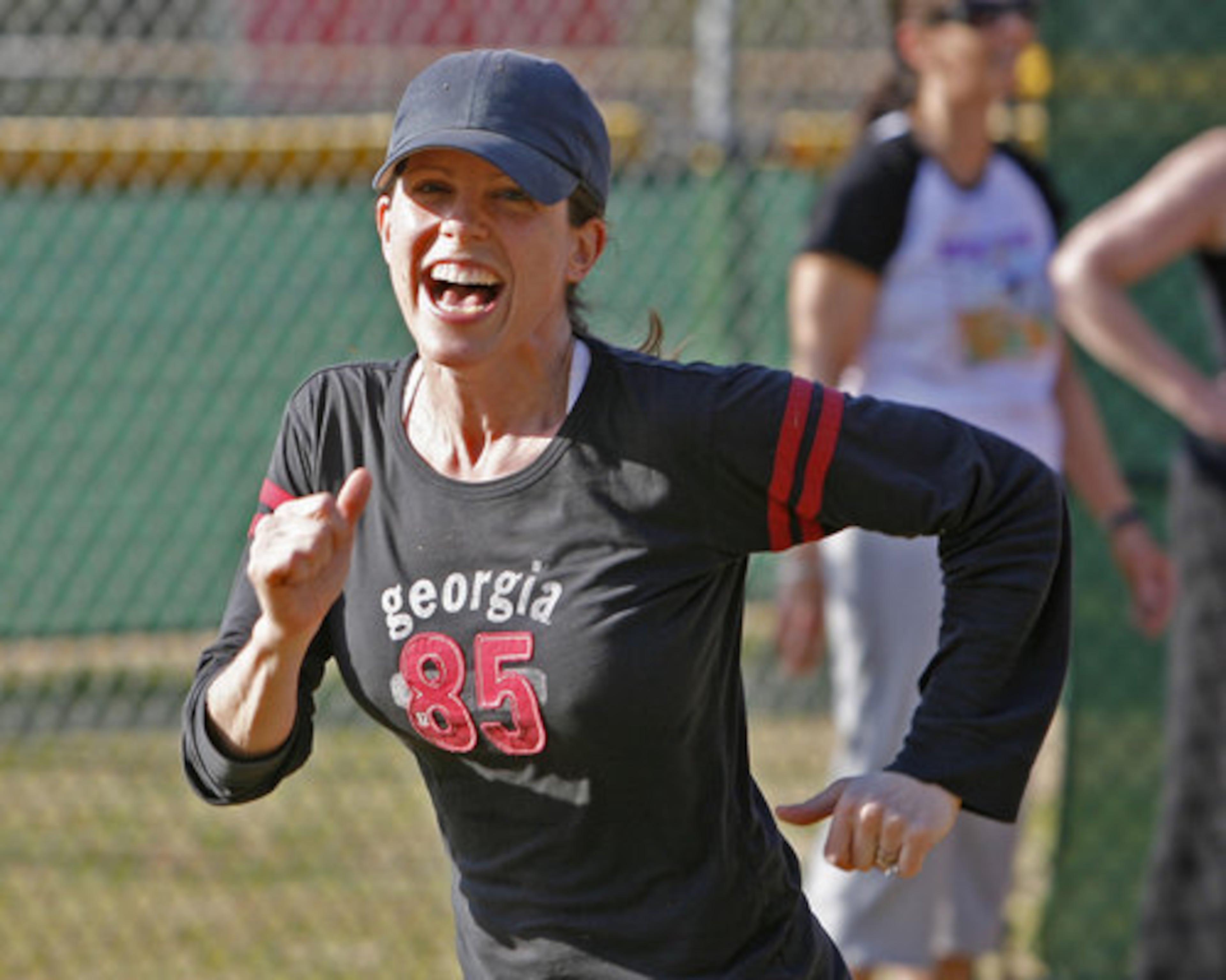 Heidi Morris, from Marietta, who operates Boot Camp in the Park, was participating in this sesson, but not instructing. She is running the bases during beach ball baseball.