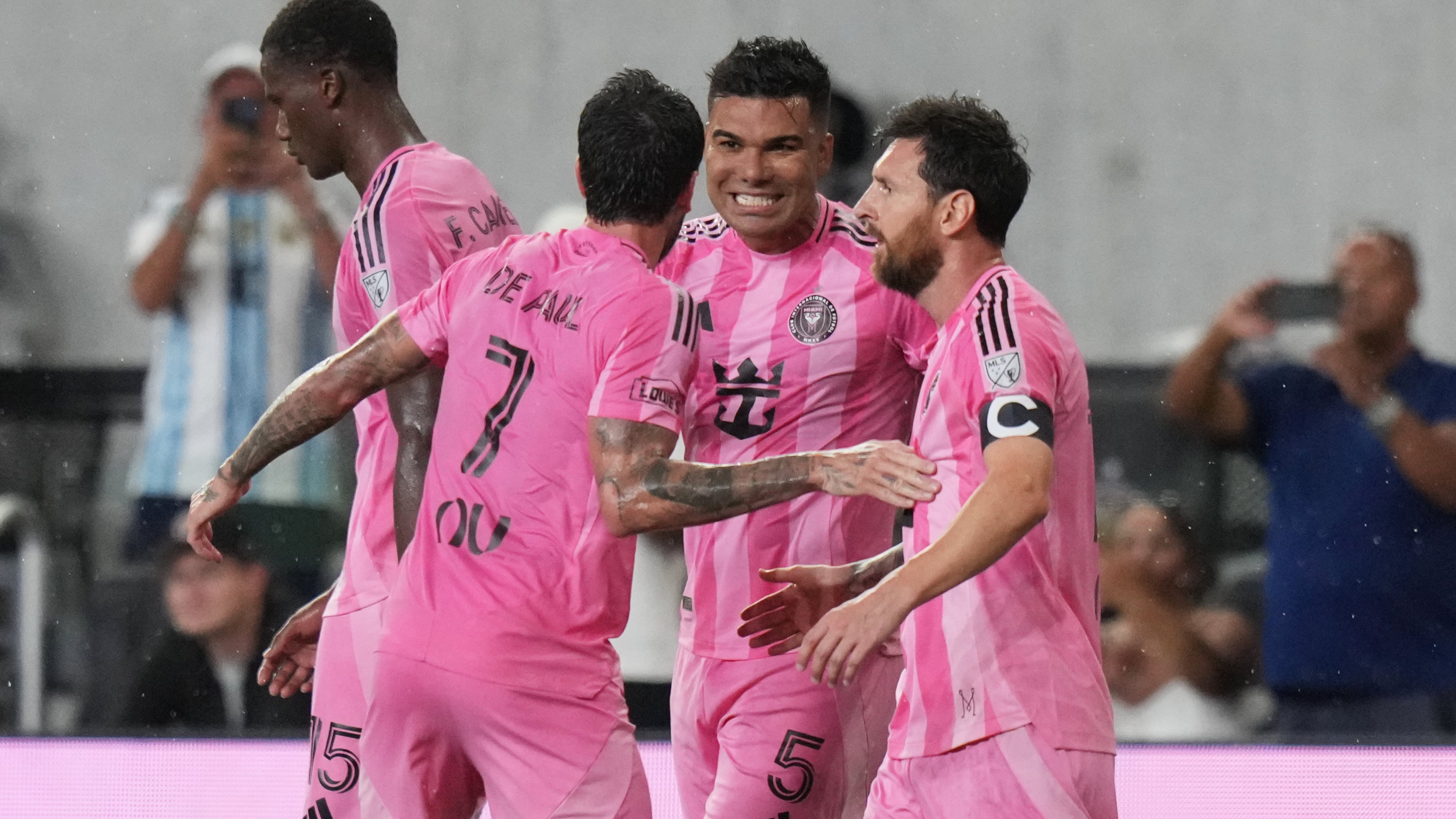 Inter Miami midfielder Casemiro (5) celebrates with midfielder Rodrigo De Paul (7) and forward Leo Messi (10) after scoring a goal during the first half of an MLS soccer match against Atlanta United, Saturday, Sept. 5, 2026, in Miami. (AP Photo/Lynne Sladky)