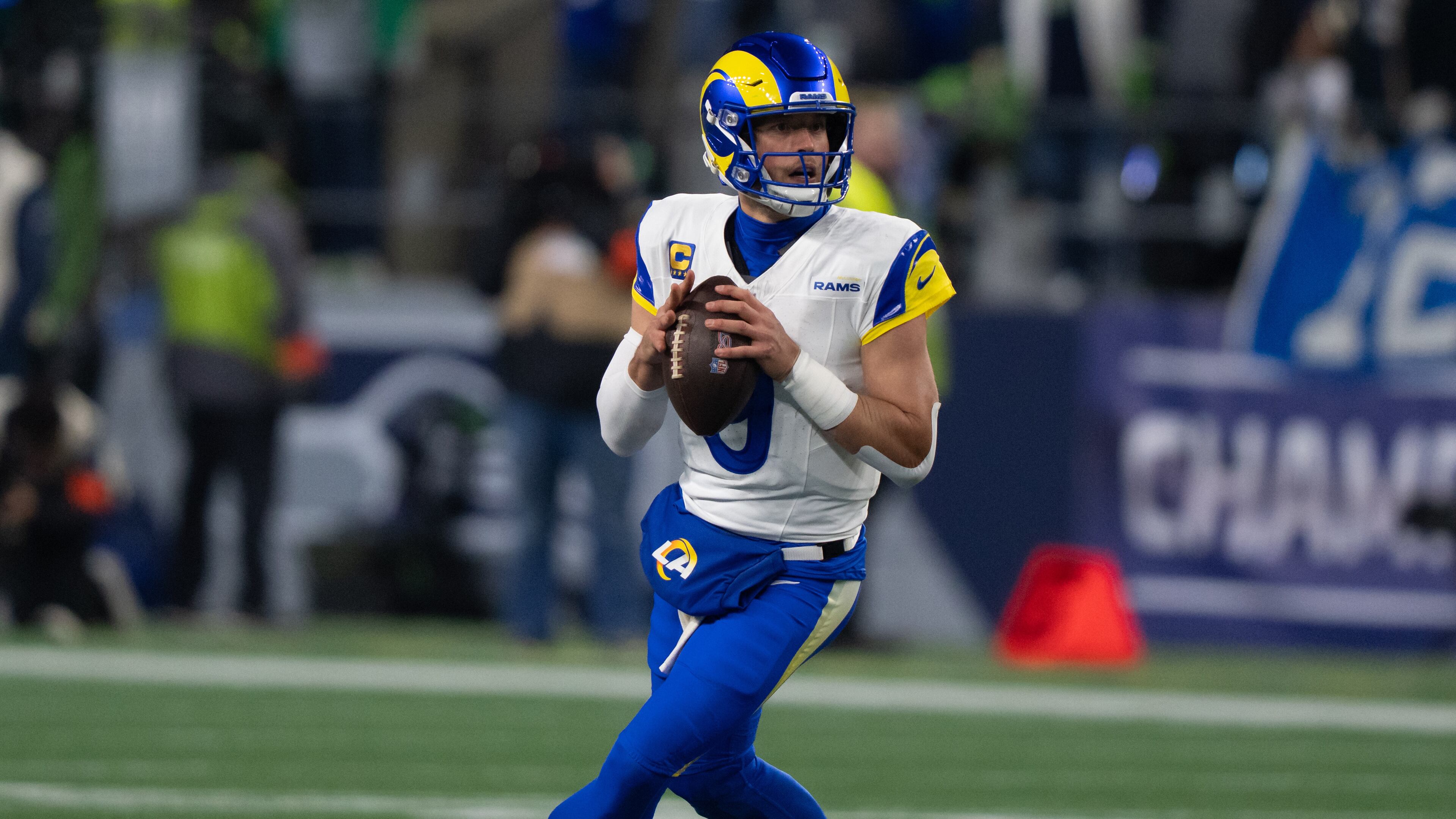FILE - Los Angeles Rams quarterback Matthew Stafford drops back to pass during a NFC Championship football game against the Seattle Seahawks, Jan. 25, 2026, in Seattle. (AP Photo/Stephen Brashear, File)