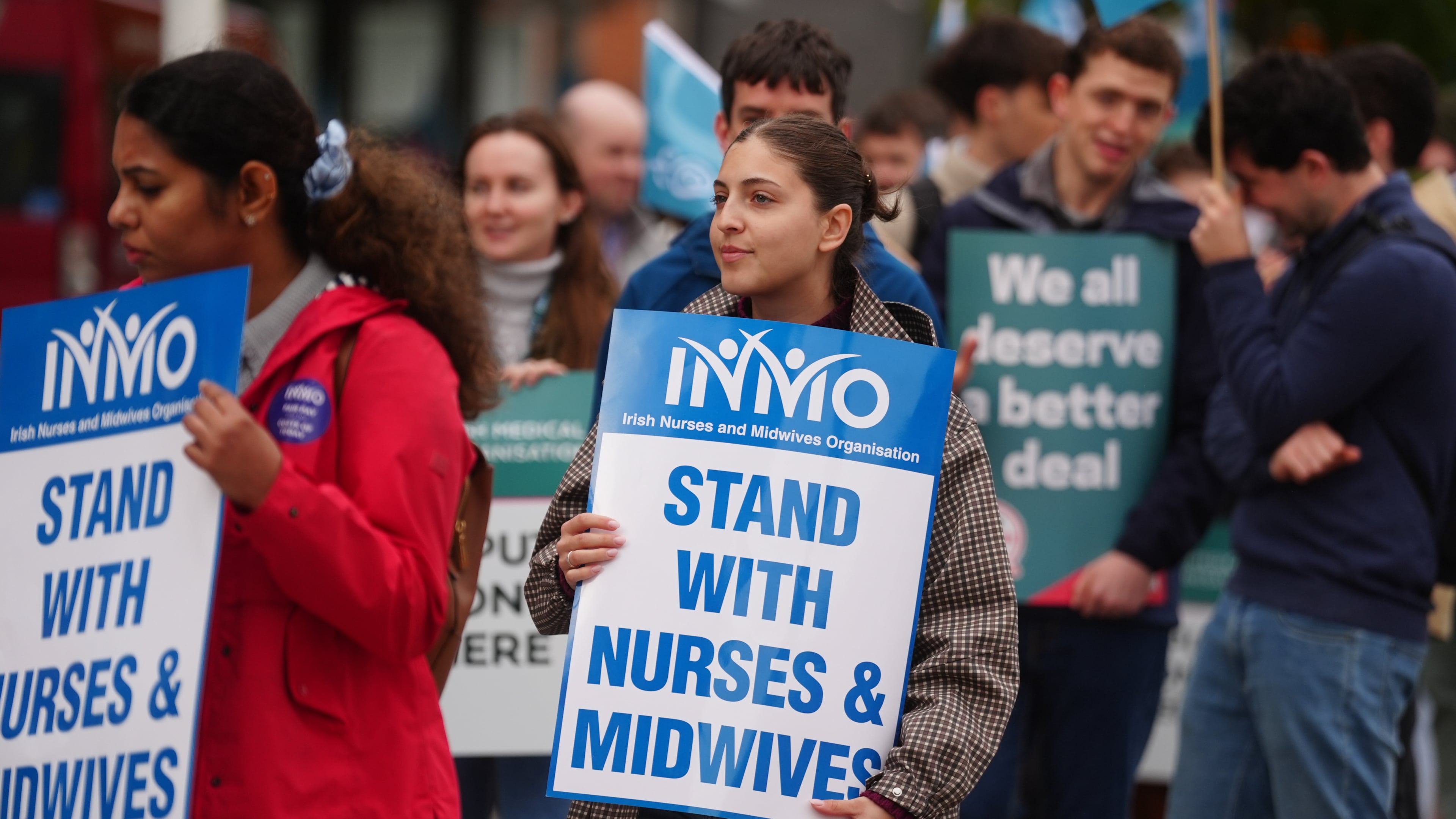 Public sector workers take part in a 24-hour strike over delays in agreeing a new public sector pay deal at Mater Hospital, Dublin, Ireland, Wednesday Oct. 14, 2026. (Brian Lawless/PA via AP)
