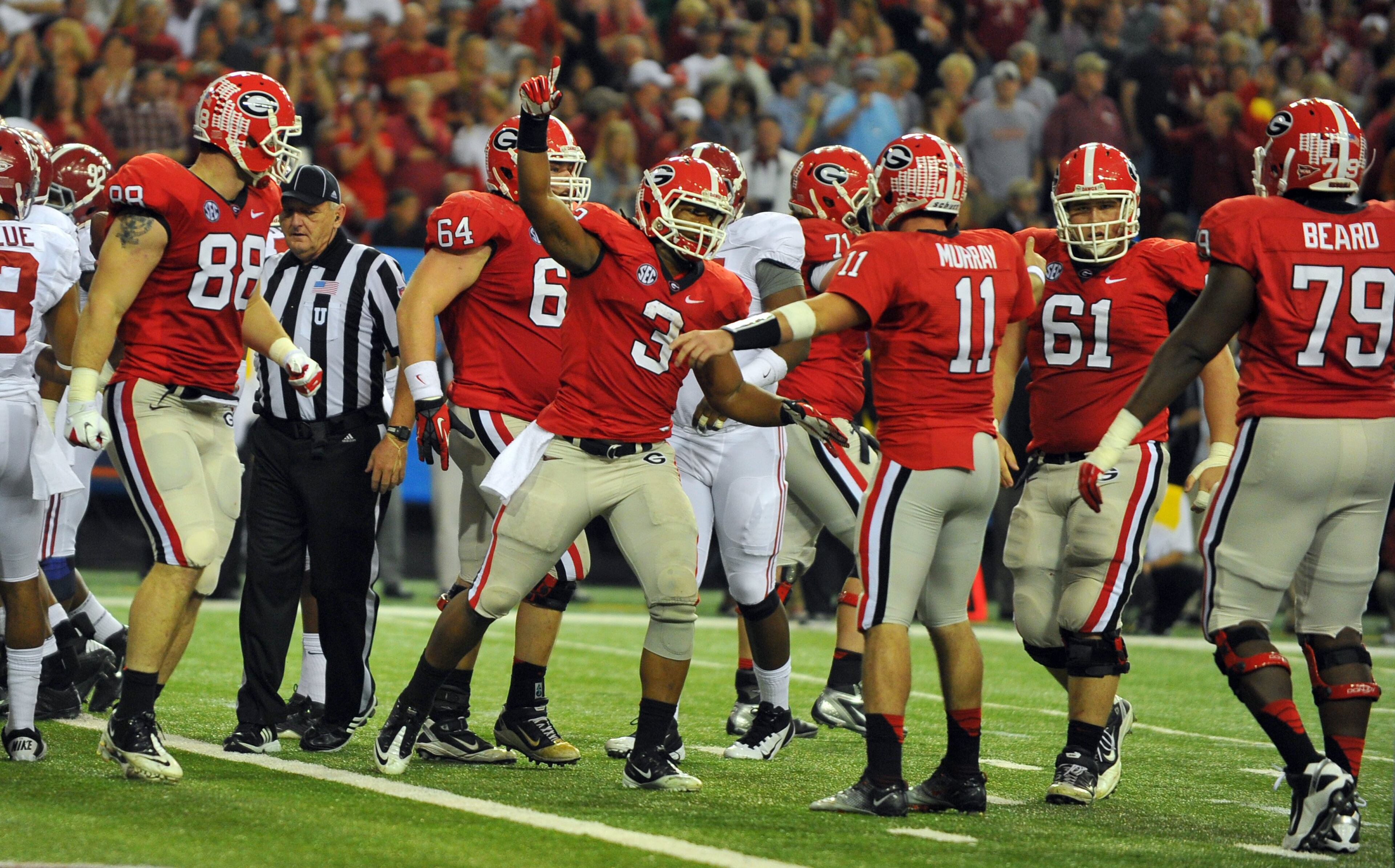 Georgia running back Todd Gurley celebrates his third-quarter touchdown that gave the Bulldogs a 14-10 lead over Alabama on Dec. 1, 2012.