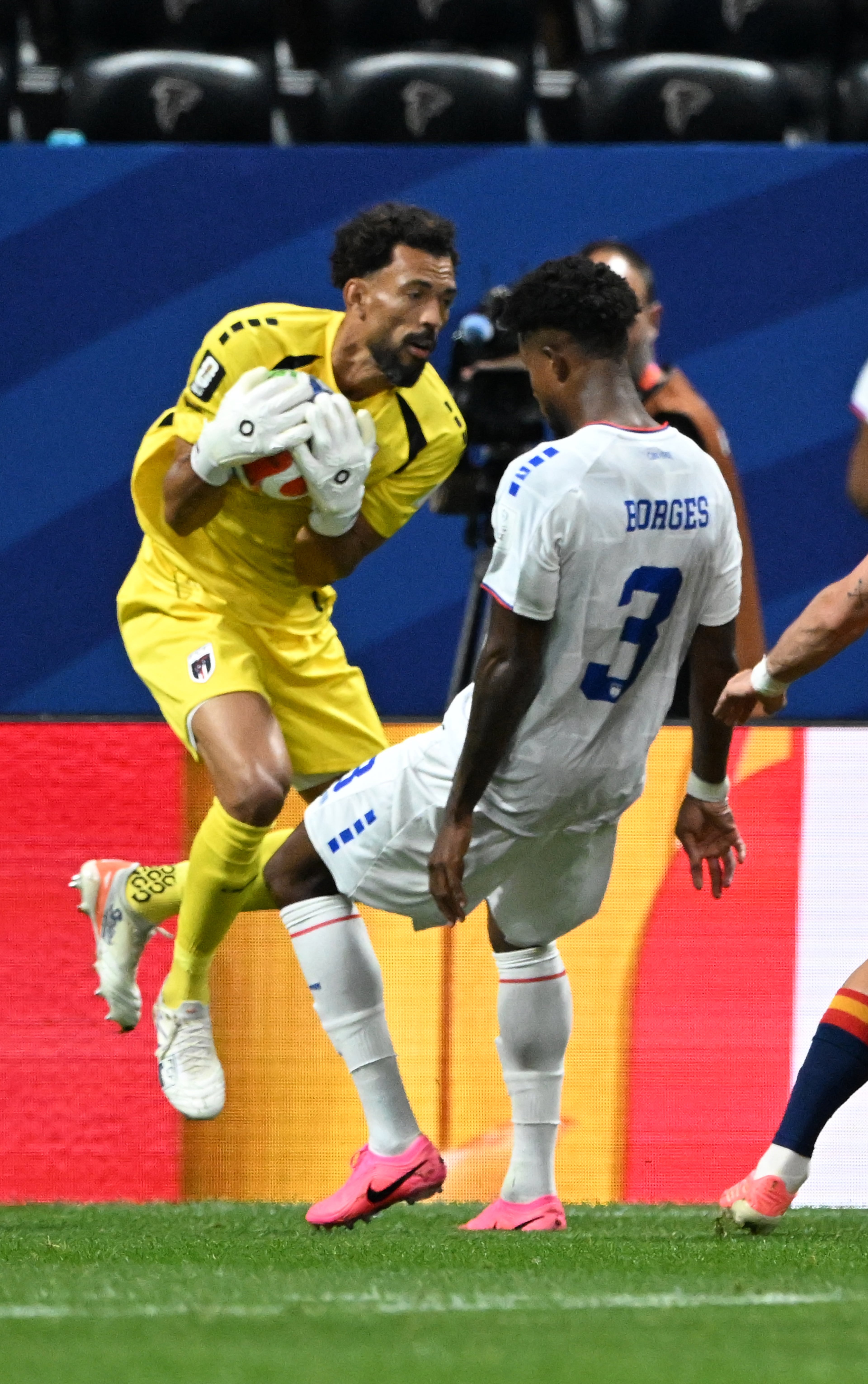 Cape Verde goalkeeper Vozinha secures the ball in front of Cape Verde's Diney Borges (right) during first half of Spain vs. Cape Verde Group H match at Atlanta Stadium (Mercedes-Benz Stadium) on Monday, June 15, 2026. (Hyosub Shin/AJC)
