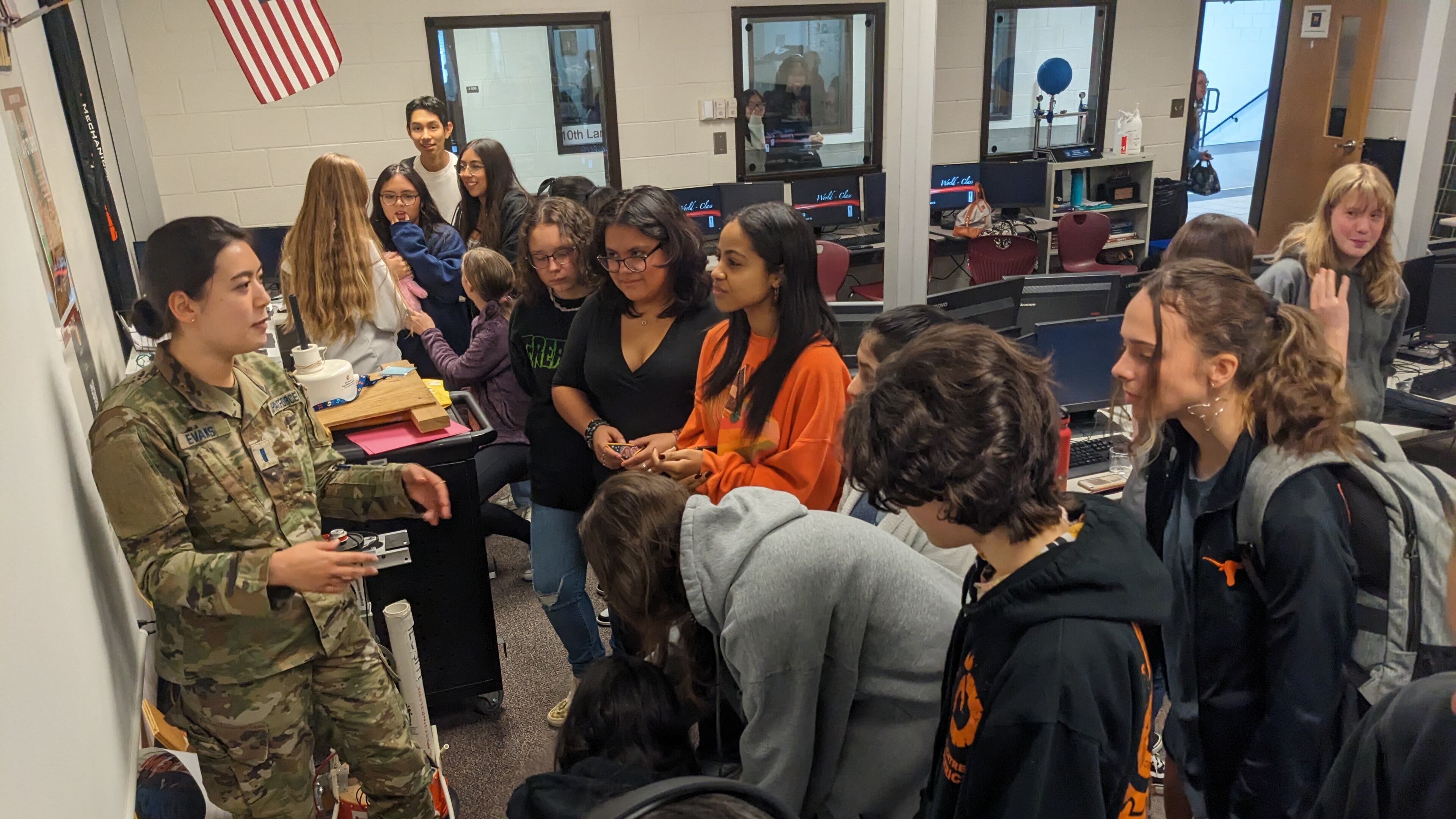 Space Force Captain Avery Evans, a 2015 Lanier High grad, speaks with the school's STEMGirls group during a recent visit.