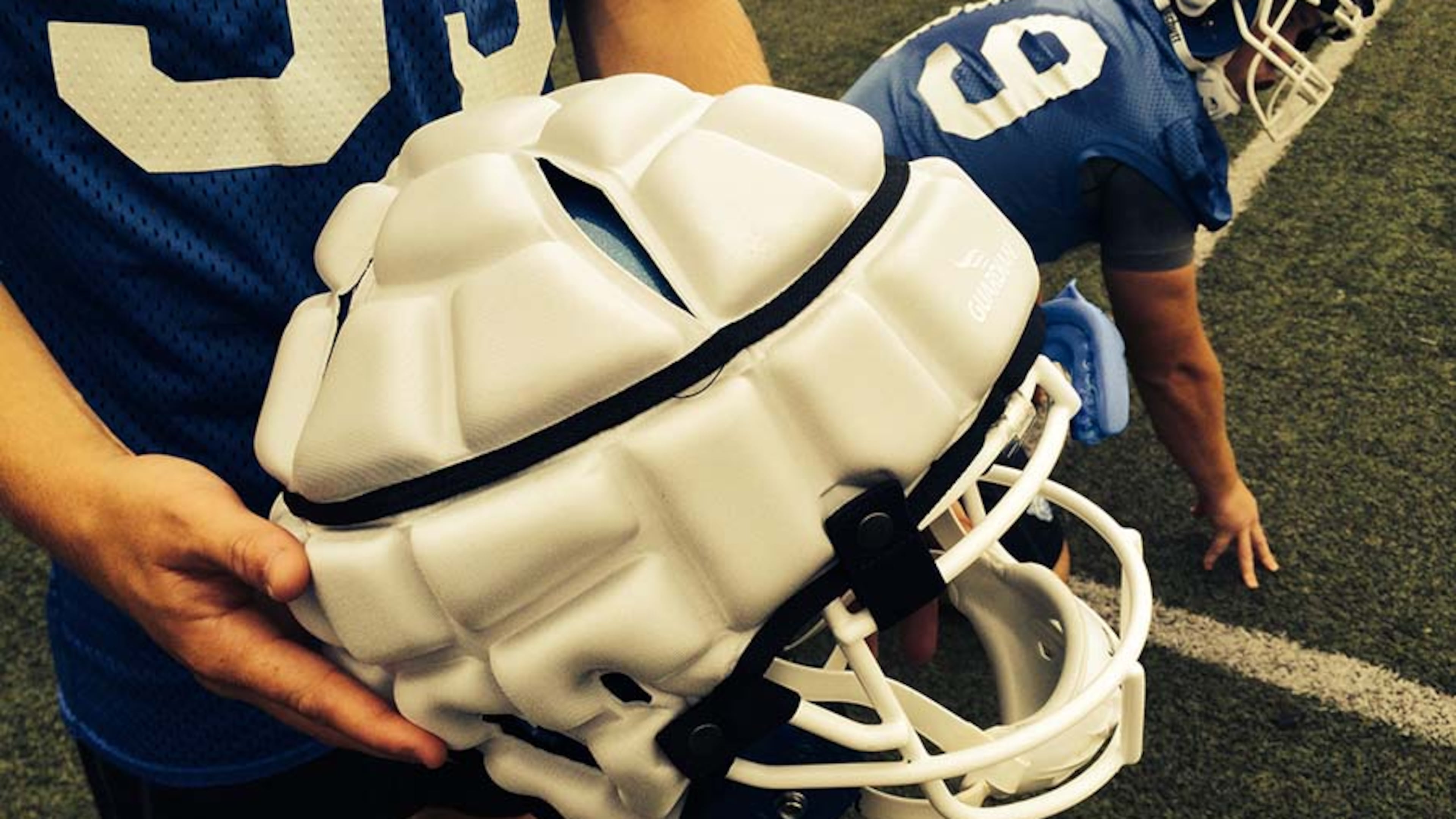 Georgia State is trying out a new padded shell -- designed by Georgia State alum -- that is worn on top of helmets and designed to reduce the force of blows to the head. It s goal is to reduce concussions.
