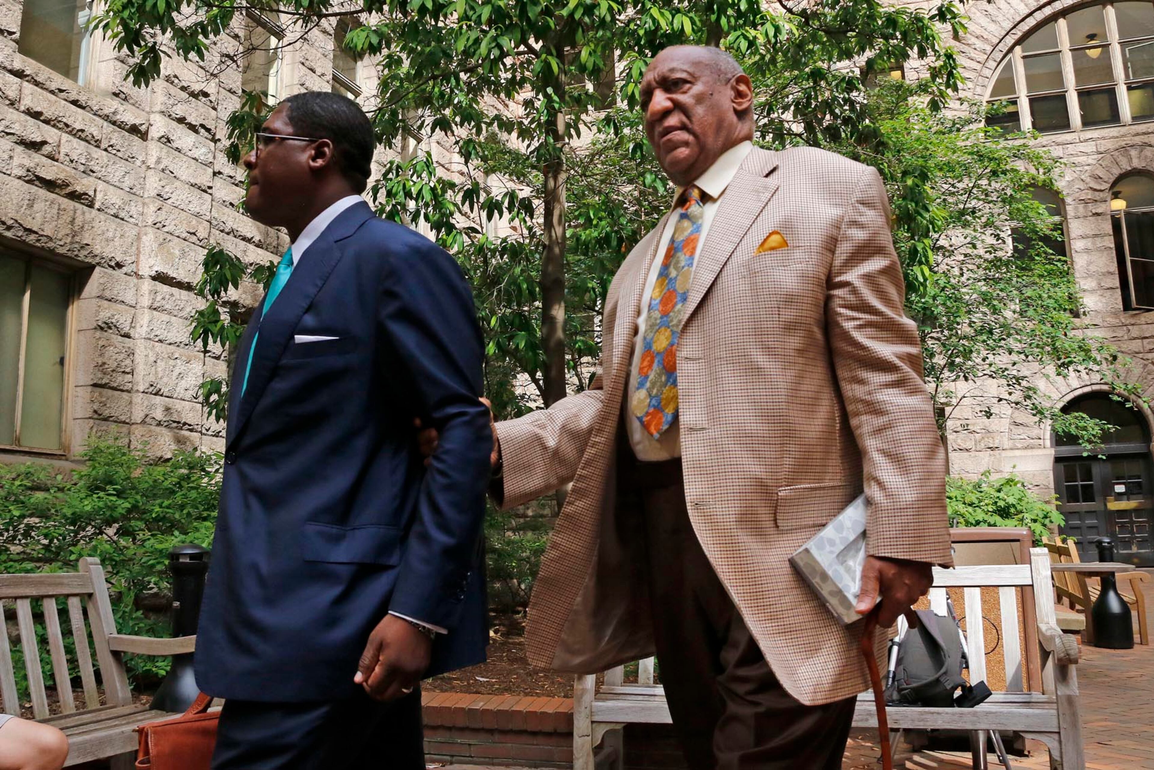 Bill Cosby, right, leaves after attending jury selection in his sexual assault case at the Allegheny County Courthouse, Monday, May 22, 2017, in Pittsburgh, Pa. The case is set for trial June 5 in suburban Philadelphia. (AP Photo/Gene J. Puskar)
