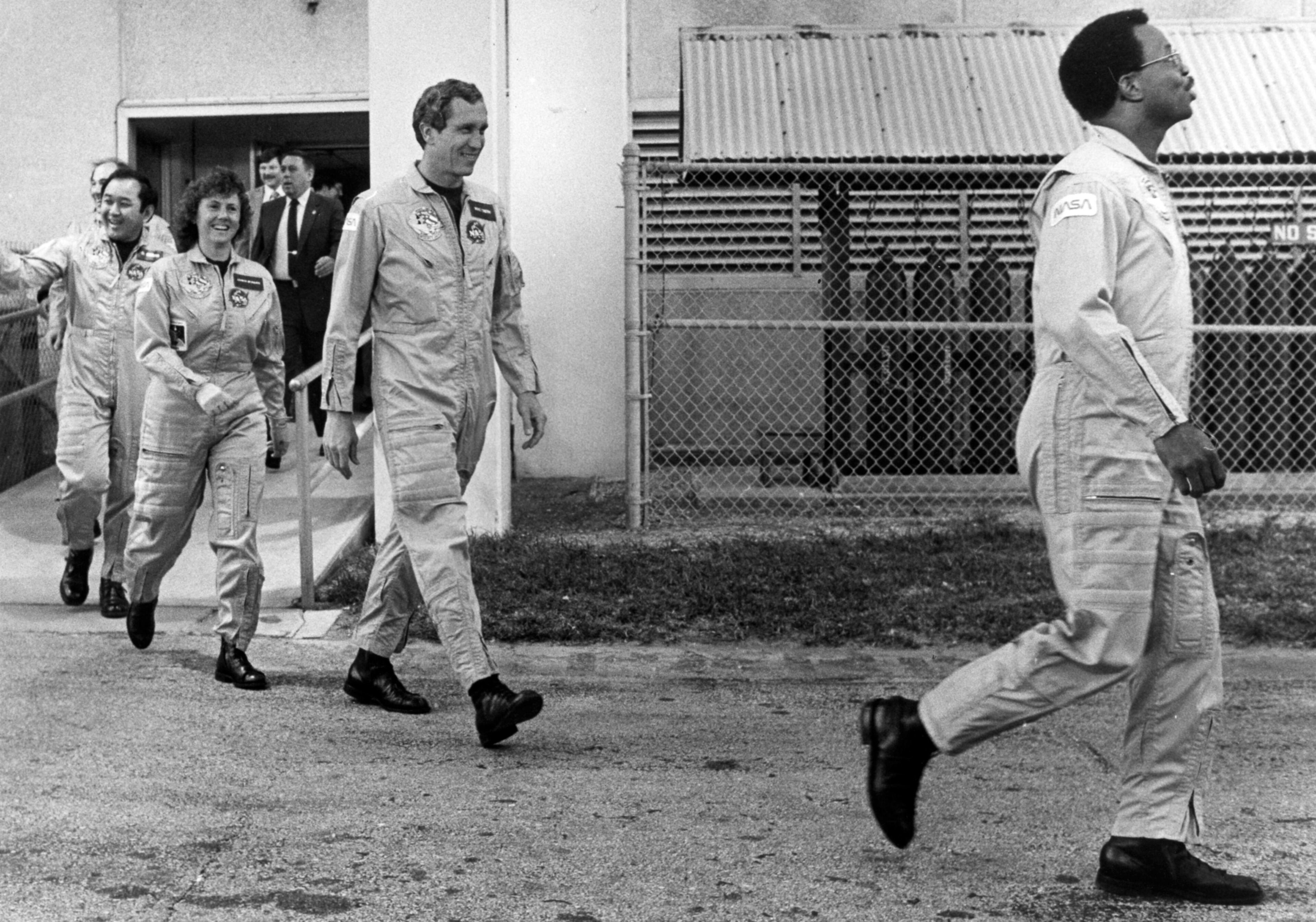 Space Shuttle Challenger crew members including Ronald McNair, far right, are seen at the Kennedy Space Center in January 1986. (Red Huber/Orlando Sentinel/TNS)
