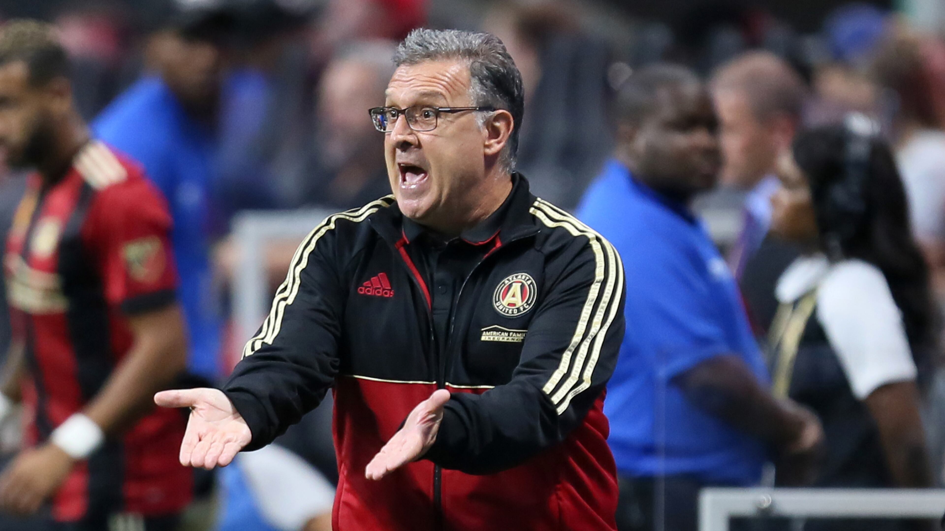 Atlanta United coach Gerardo 'Tata' Martino gives direction to his players during the second half.