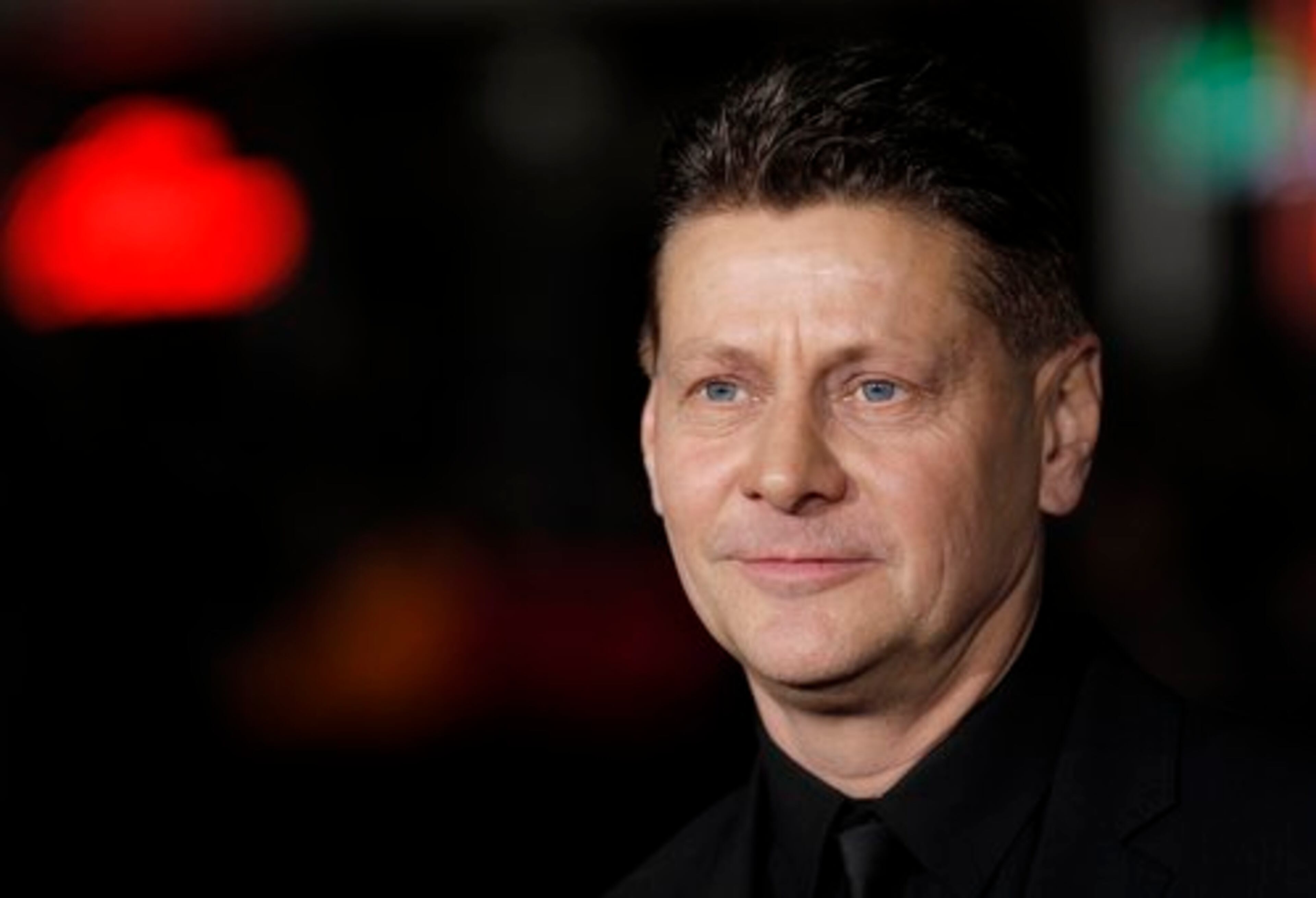 Director and writer Andrew Niccol arrives at the premiere.