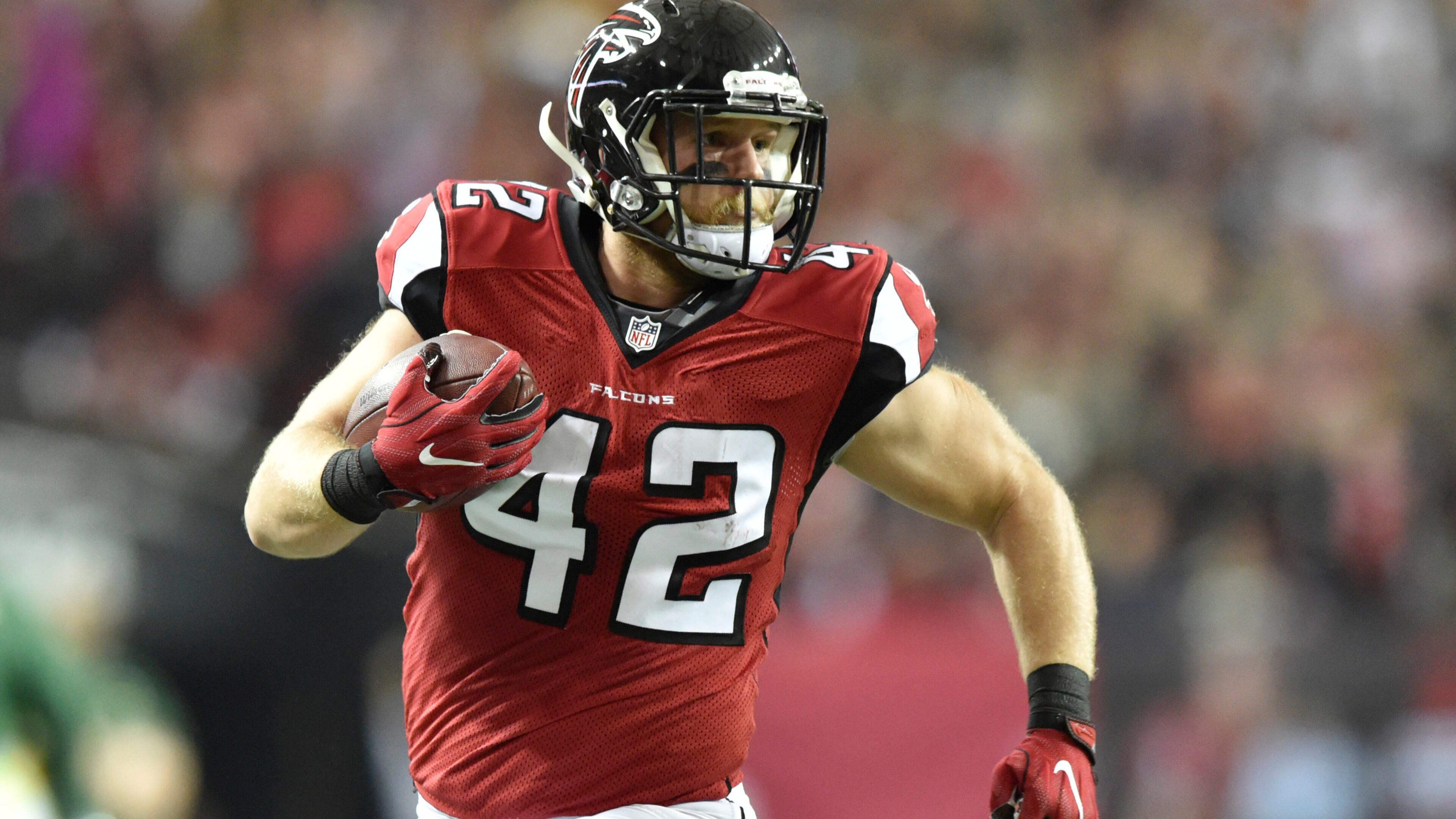 January 22, 2017, Atlanta - Falcons fullback Patrick DiMarco (42) runs with the ball during the NFC Championship game against the Packers in Atlanta, Georgia, on Sunday, January 22, 2017. (DAVID BARNES / DAVID.BARNES@AJC.COM)