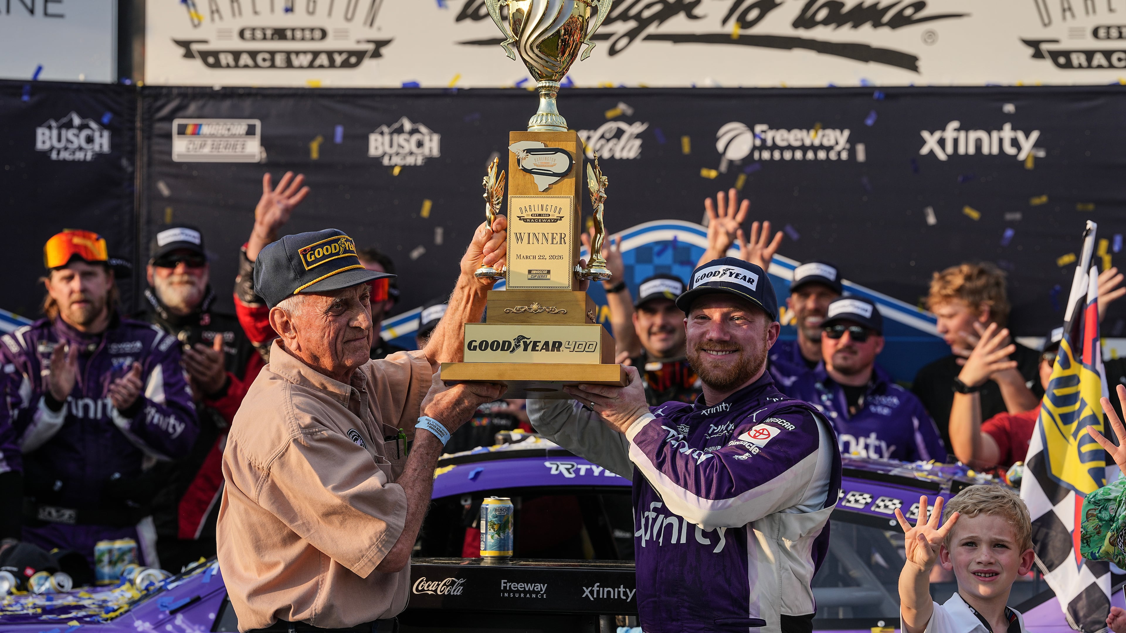 Tyler Reddick, center right, celebrates with his team in Victory Lane after winning a NASCAR Cup Series auto race, Sunday, March 22, 2026, in Darlington, S.C.(AP Photo/Matt Kelley)