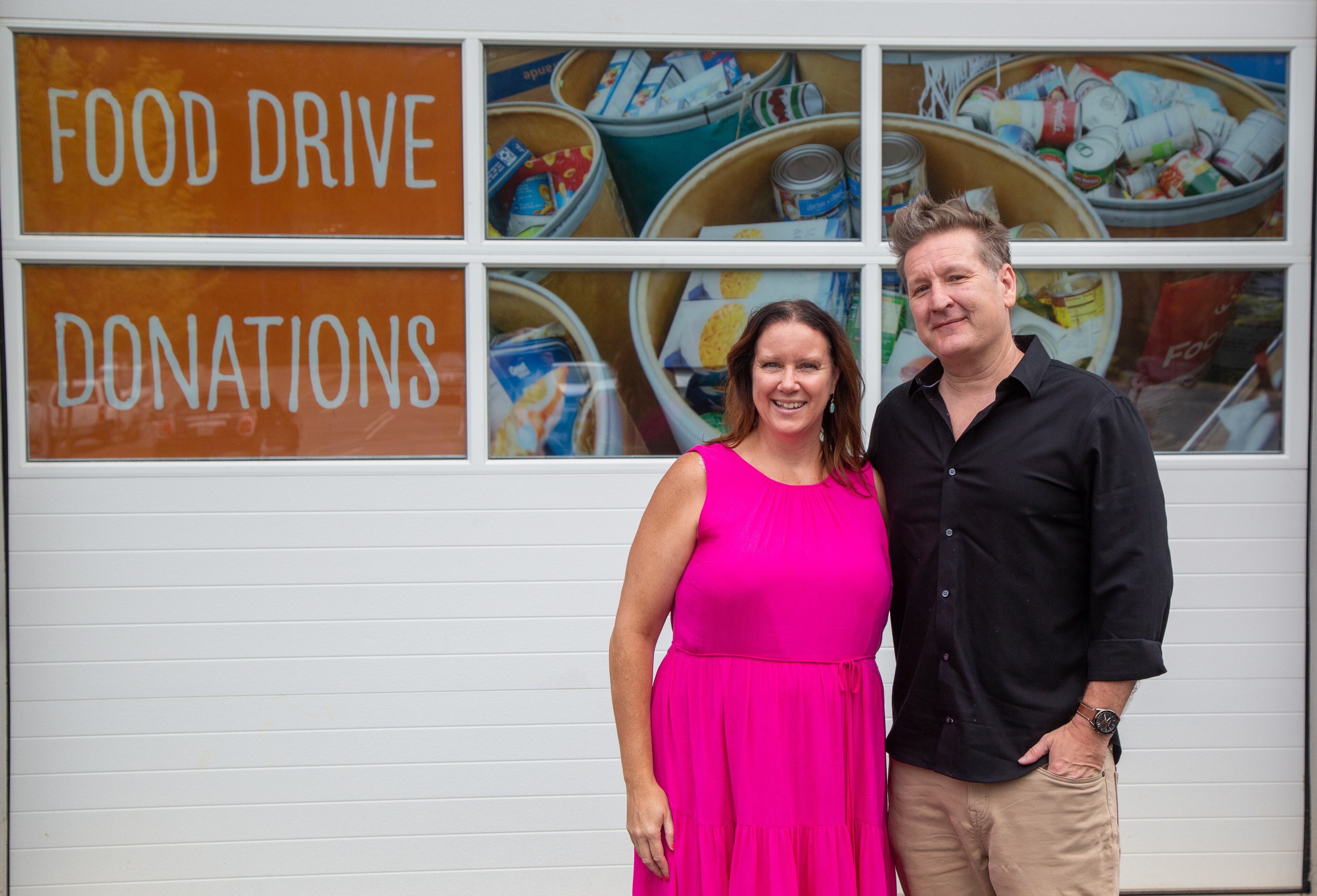 Crystal Genter and Stephen Cook, of the architectural firm Goode Van Slyke, at the Atlanta Community Food Bank in East Point. The firm is celebrating its 25th anniversary by doing 25 good deeds. PHIL SKINNER FOR THE ATLANTA JOURNAL-CONSTITUTION.