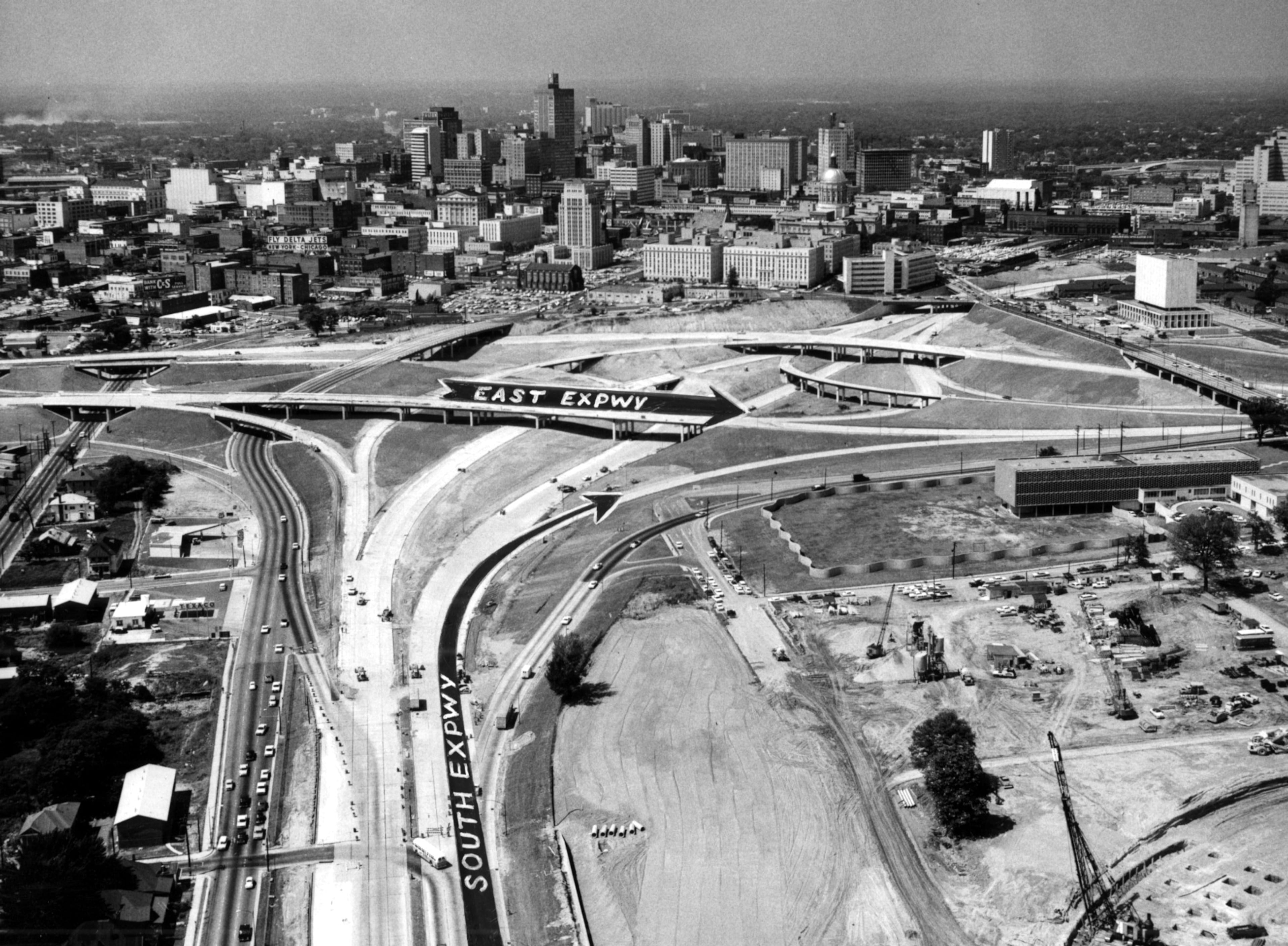 1964 - Atlanta, Ga.: Expressway bottleneck unplugged: Ramp connecting the northbound lanes of the South Expressway to the eastbound lanes of the East Expressway (I-20) open to traffic Friday, removing a bottleneck of having to cross Capitol Avenue via Clark Street SE.
