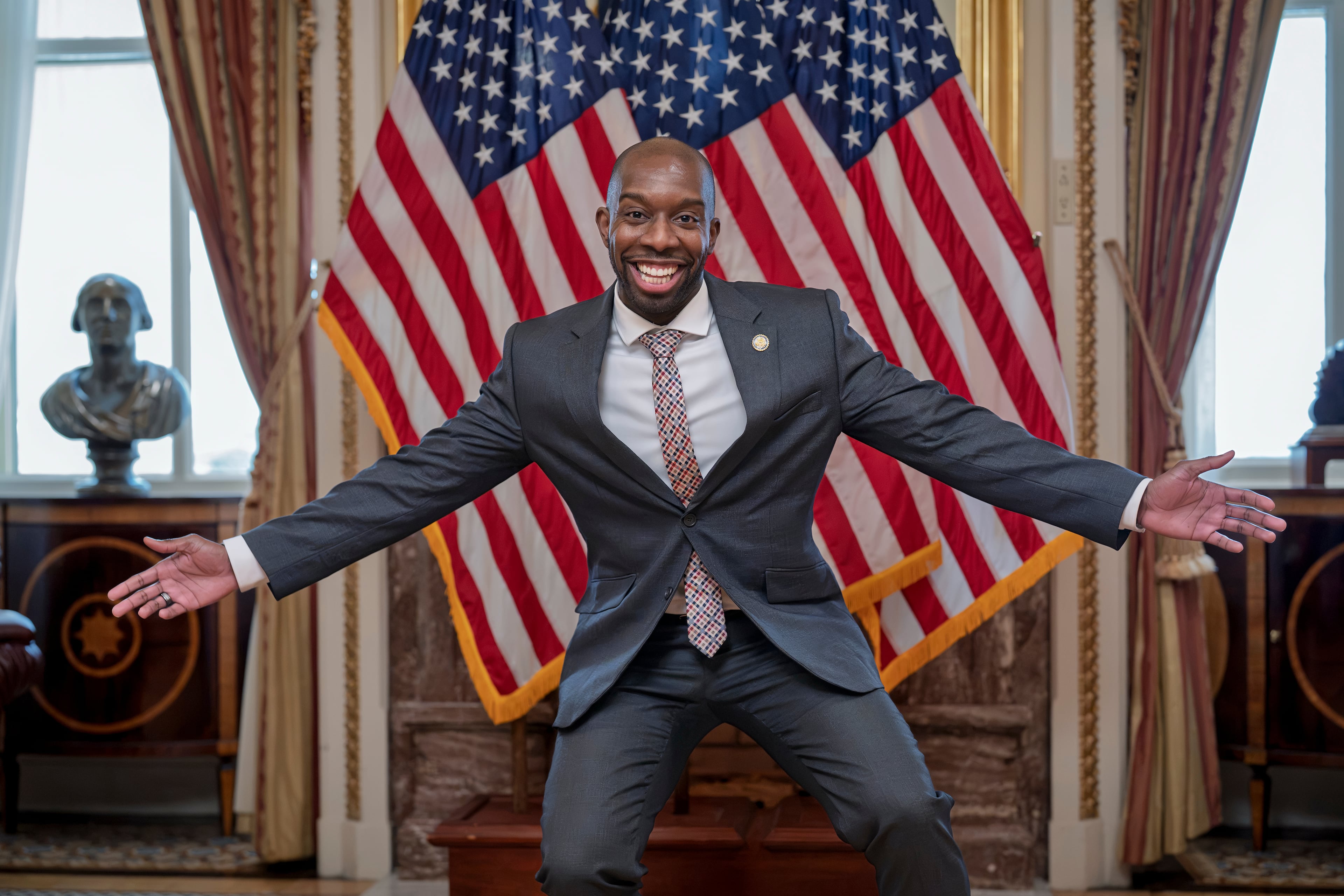 After being sworn-in on the floor of the House of Representatives earlier in September, Rep. Everton Blair, D-Ga., celebrates at the Capitol in Washington. (J. Scott Applewhite/AP)