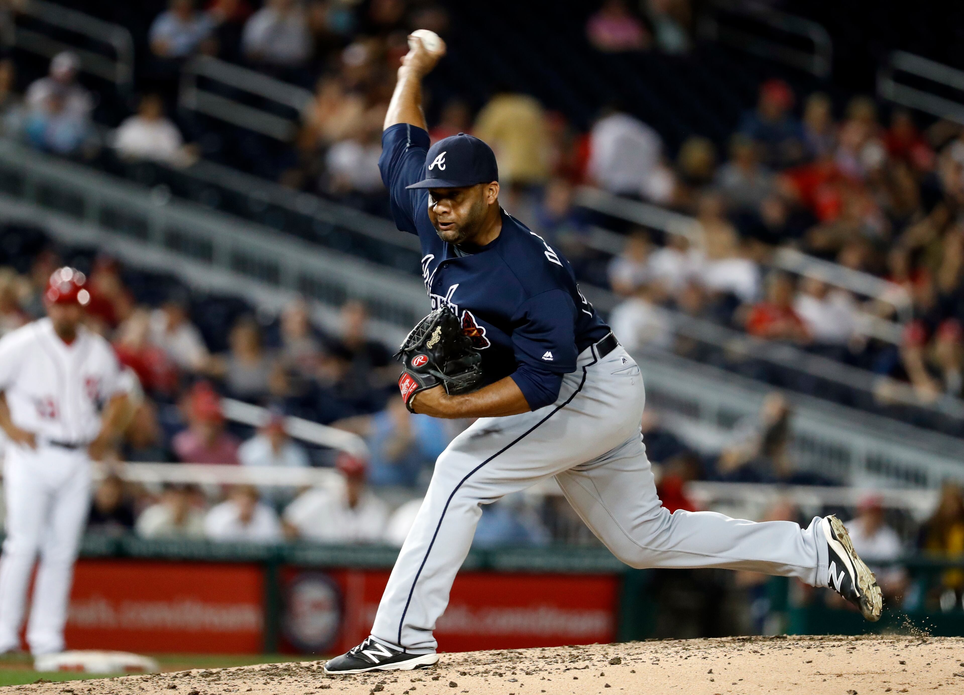 Atlanta Braves relief pitcher Joel De La Cruz throws during the third inning of a baseball game against the Washington Nationals at Nationals Park, Tuesday, Sept. 6, 2016, in Washington. De La Cruz replaced starting pitcher Williams Perez. (AP Photo/Alex Brandon)