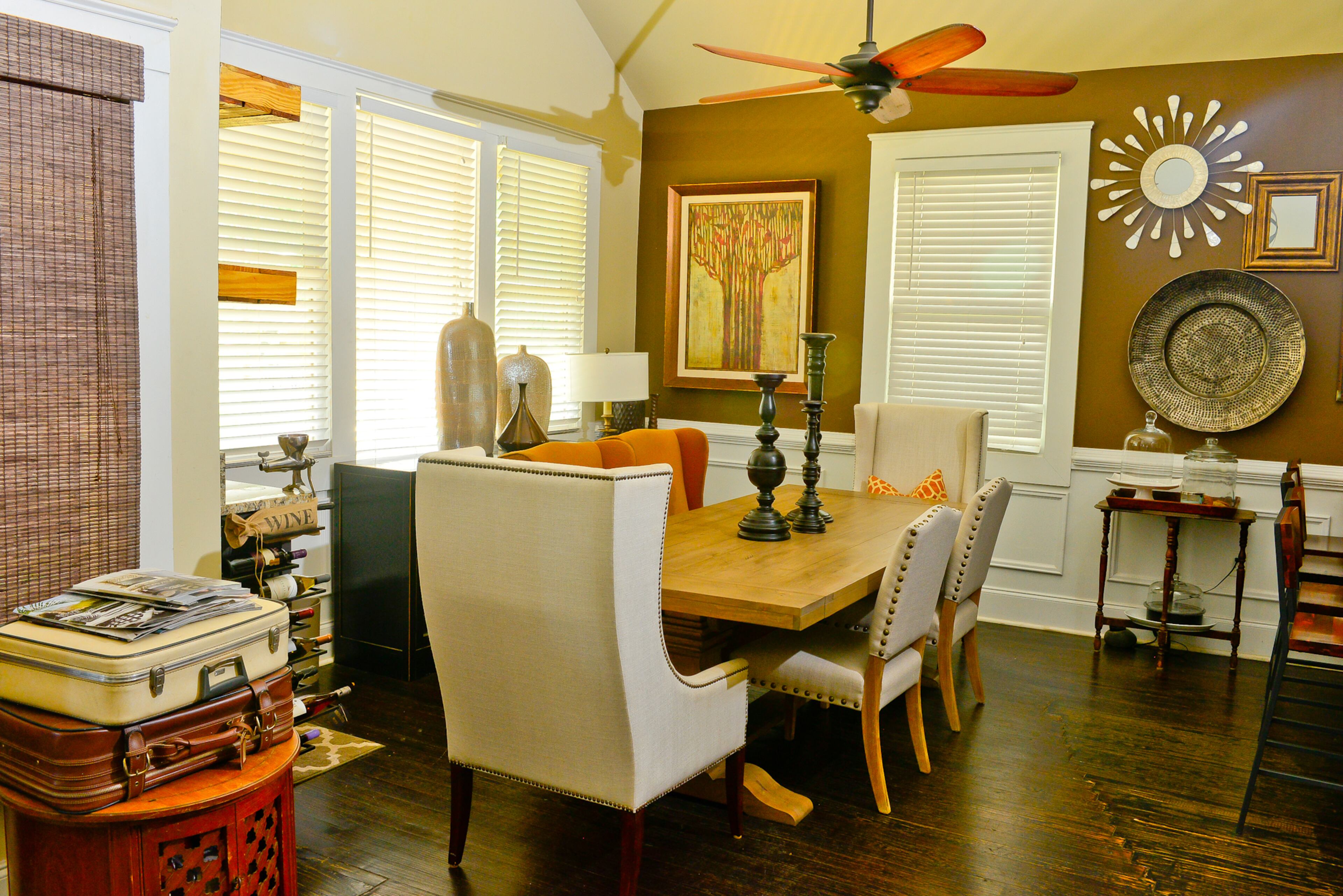 Original hardwood flooring from this home's 1908 construction creates a consistent and historic footing for the renovated floor plan, which was opened up in 2013.