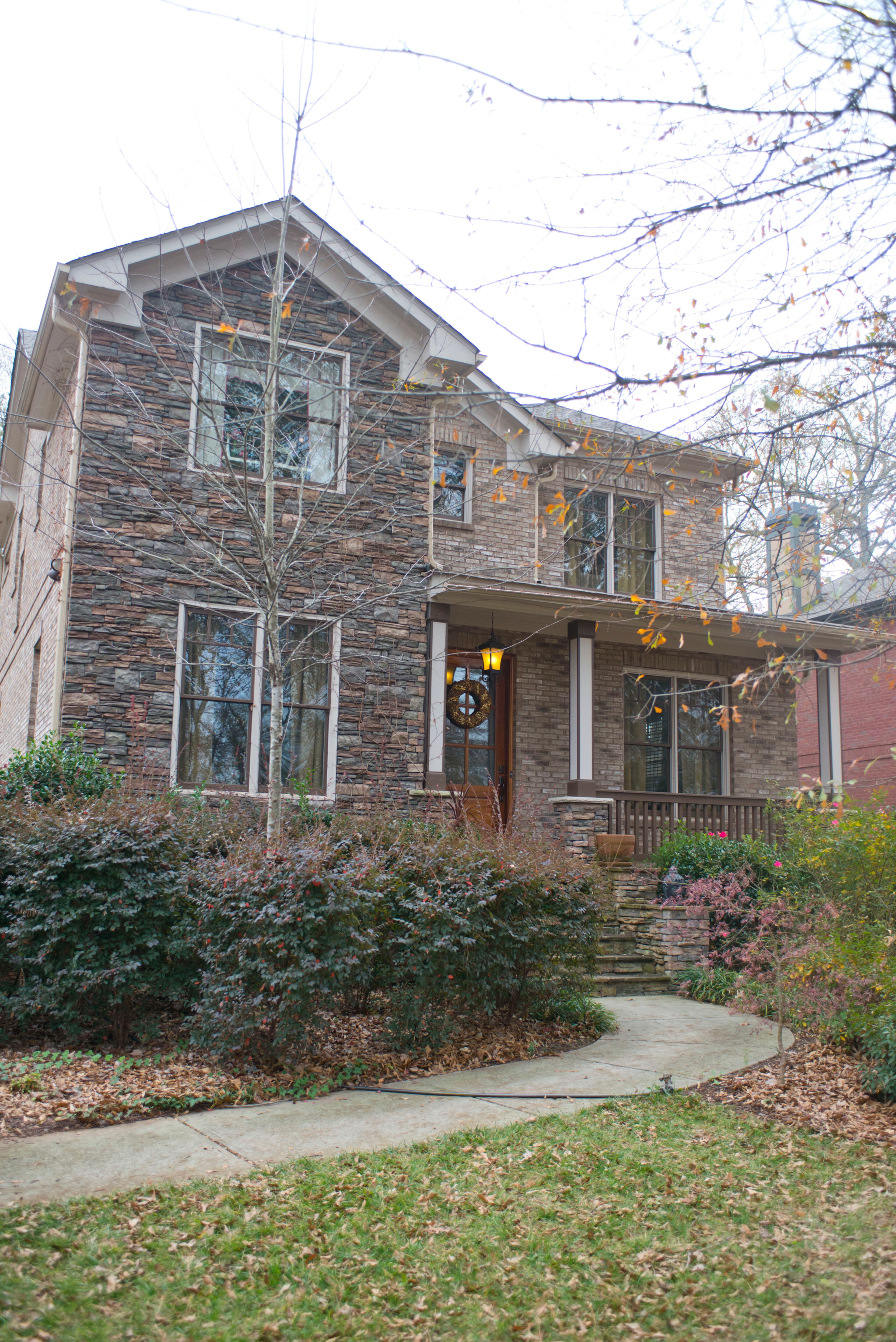 The home is mixture of Craftsman and row house styles, according to Kevin. His favorite architectural feature is the exterior material — stone, brick and wood. “I just like how strong it looks and masculine and how well-built it looked,” Kevin said. “I love a brick home because I think it’s timeless and it’s nice to have that element mixed with the stone.”