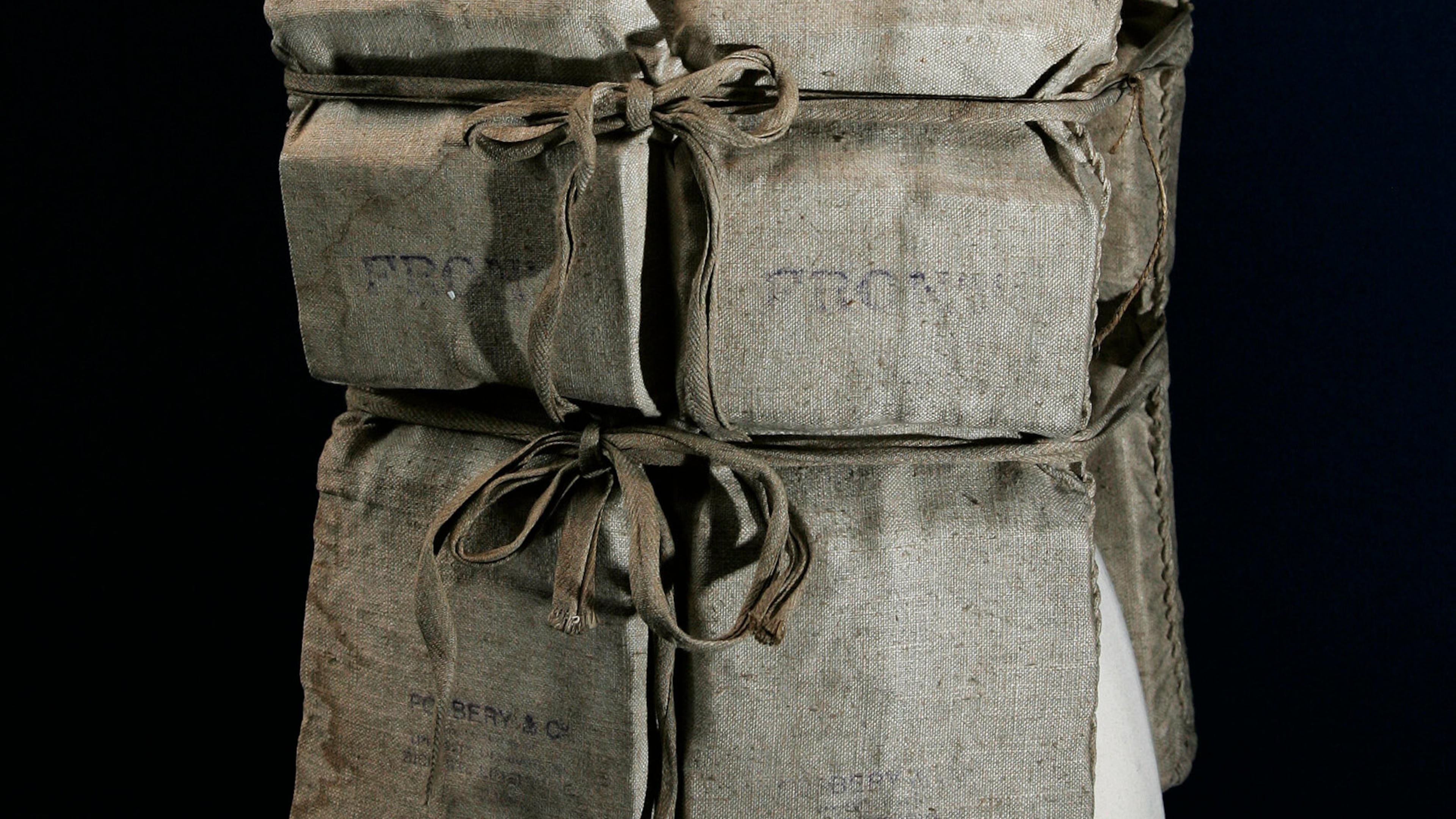 FILE - A Titanic life-preserver, belong to a survivor is shown, London, Wednesday, May 16, 2007. ((AP Photo/Sang Tan)