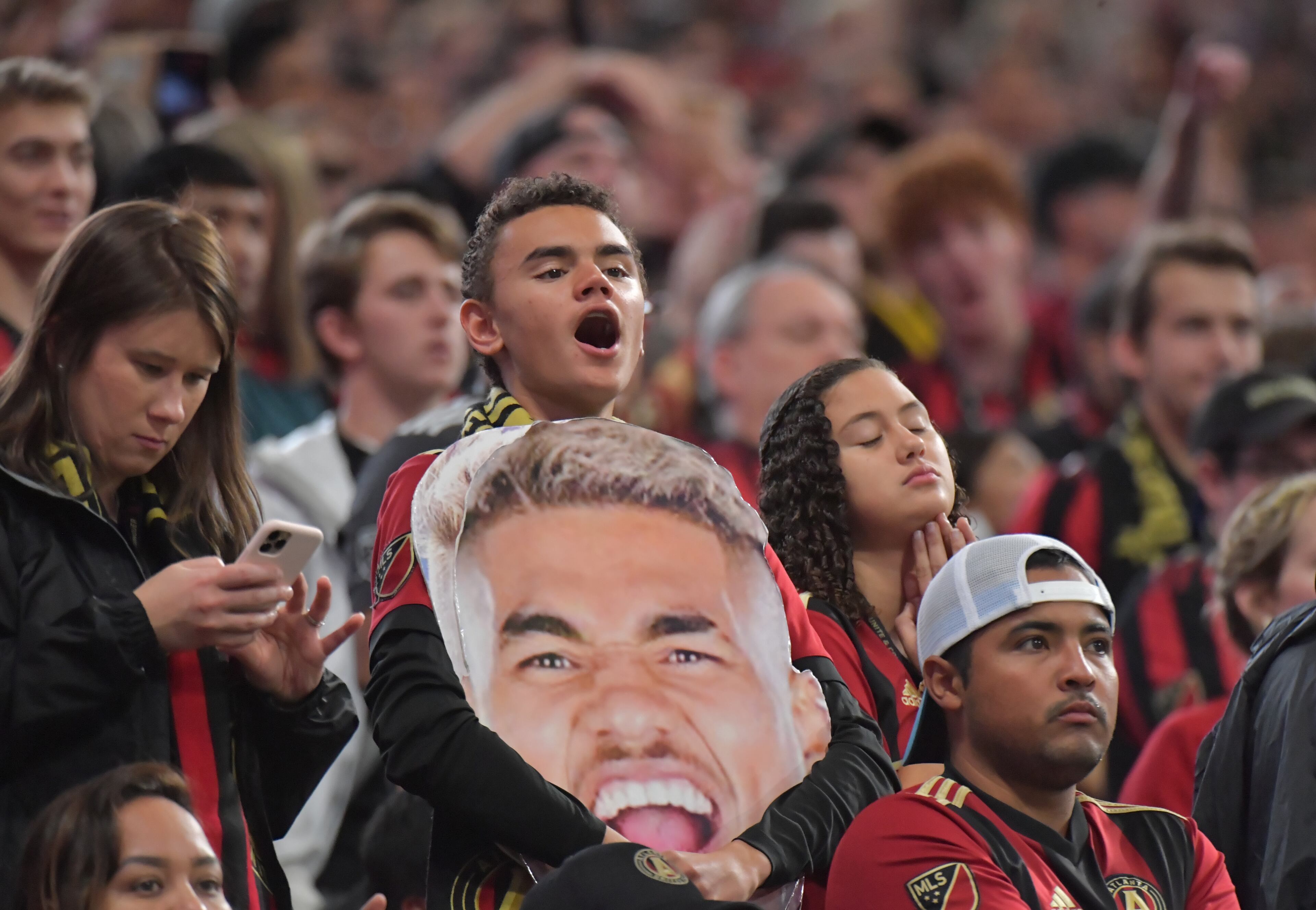 Atlanta United fans cheer in the second half during the first round of the MLS playoffs at Mercedes-Benz Stadium on Saturday, October 19, 2019. Atlanta United won 1-0 over the New England Revolution. (Hyosub Shin / Hyosub.Shin@ajc.com)