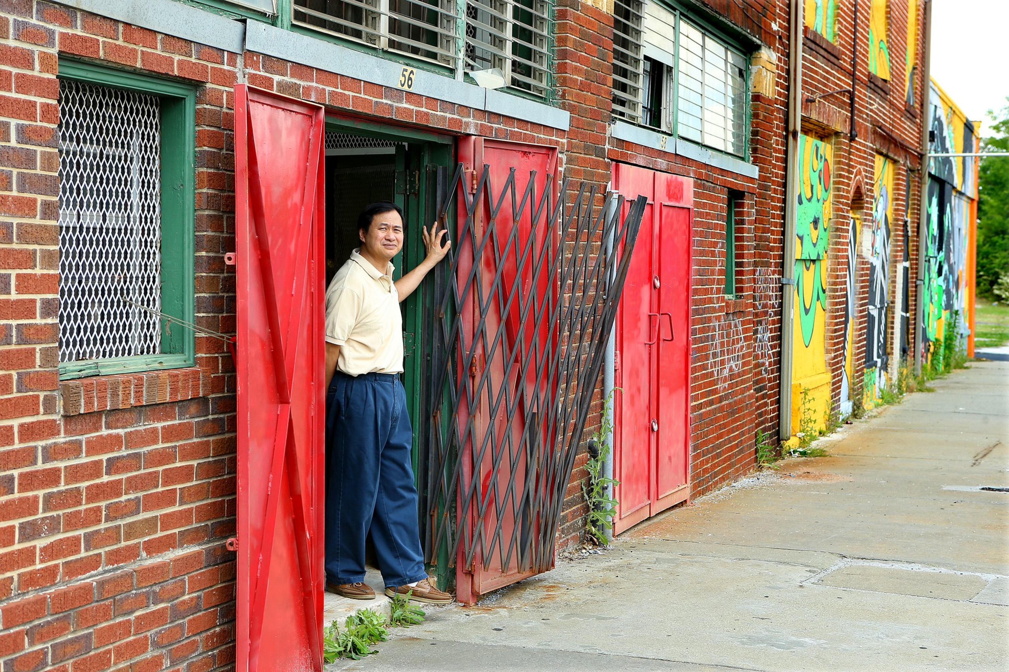 Paul Kwan, 58, owner of Joe’s Laundry & Cleaners, had one of the few businesses still open on Georgia Avenue near Turner Field on Thursday, May 8, 2014, in Atlanta. (Curtis Compton / Curtis.Compton@ajc.com)