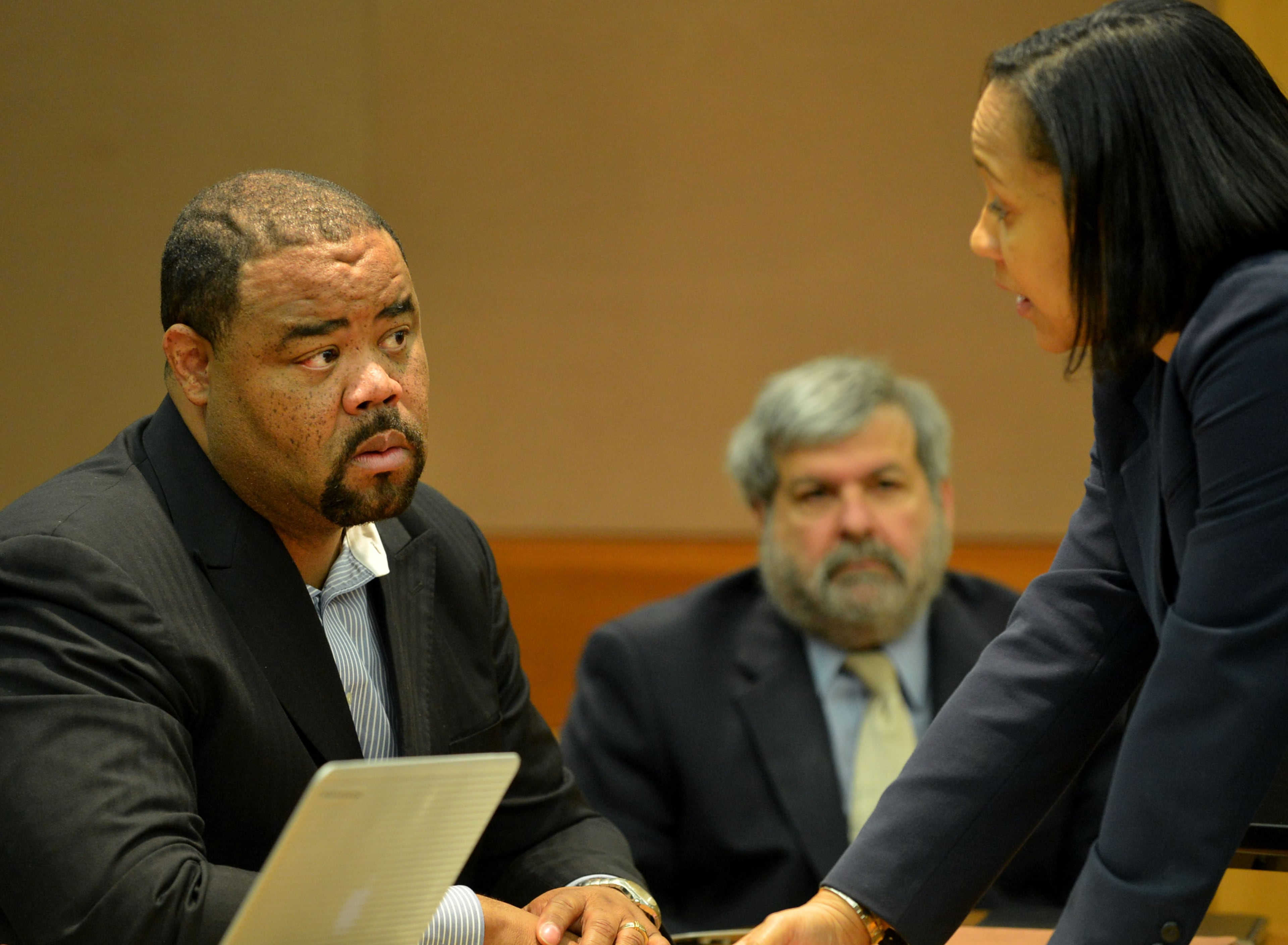 Christopher Waller listens to terms of his plea agreement from Fulton prosecutor Fani Willis during the hearing. Waller, the former principal of Parks Middle School, sits with his attorney, Don Samuel (right), before he pleaded guilty and agreed to cooperate with prosecutors. Waller avoided prison time as a first-time offender. Instead, he must pay $50,000 in fines and restitution, serve five years of probation, perform 1,000 hours of community service and apologize.Educators in the Atlanta Public Schools cheating scandal enter pleas before Judge Jerry Baxter in Fulton County Superior Court Friday, February 21, 2014. Any defendants in the widespread Atlanta Public Schools cheating case who don't make guilty pleas by the end of Friday will likely go on trial this spring, including Superintendent Beverly Hall and senior members of her staff. KENT D. JOHNSON / KDJOHNSON@AJC.COM