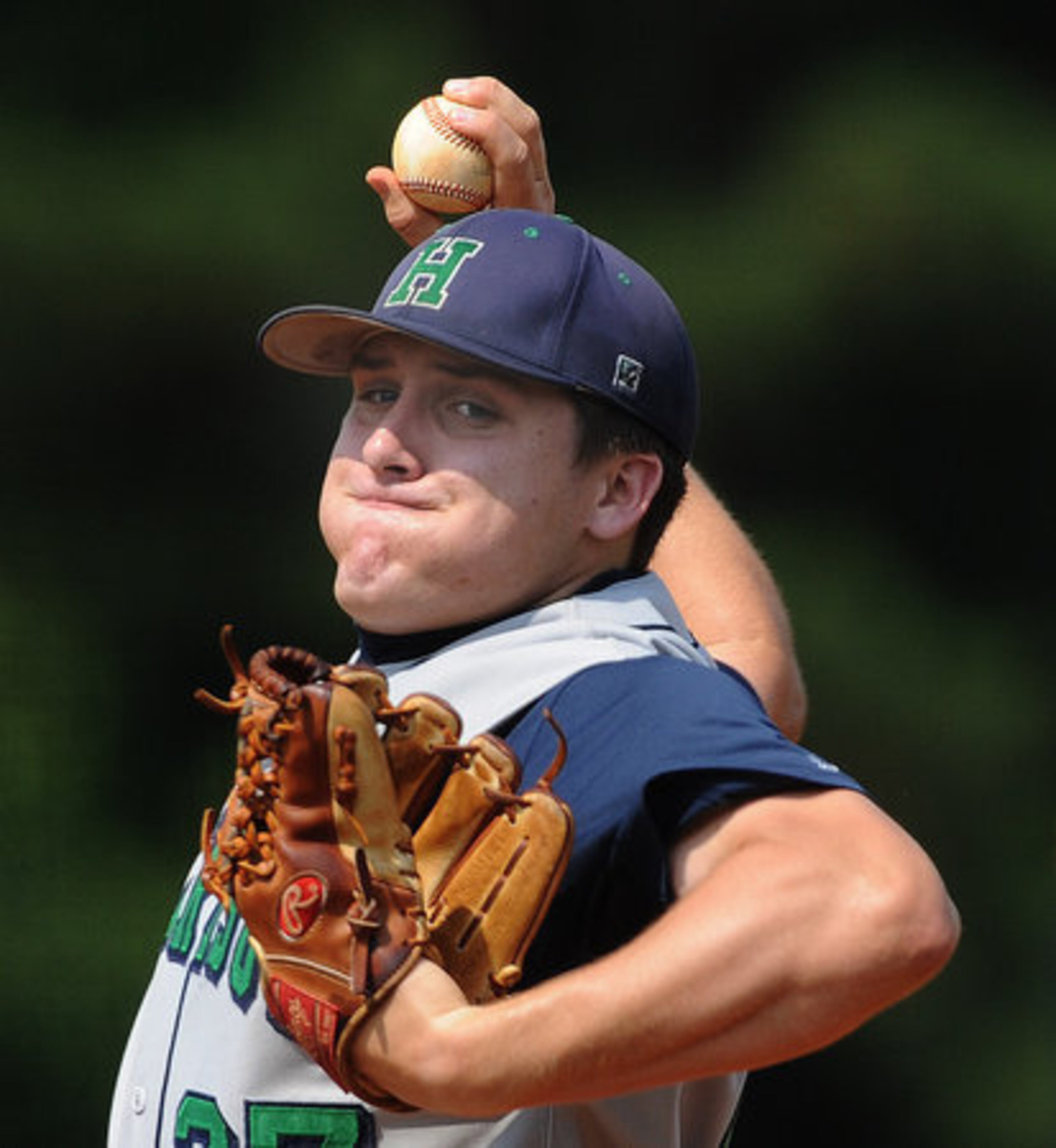 Harrison High School's Devin Rentz (27) pitches in the second inning.