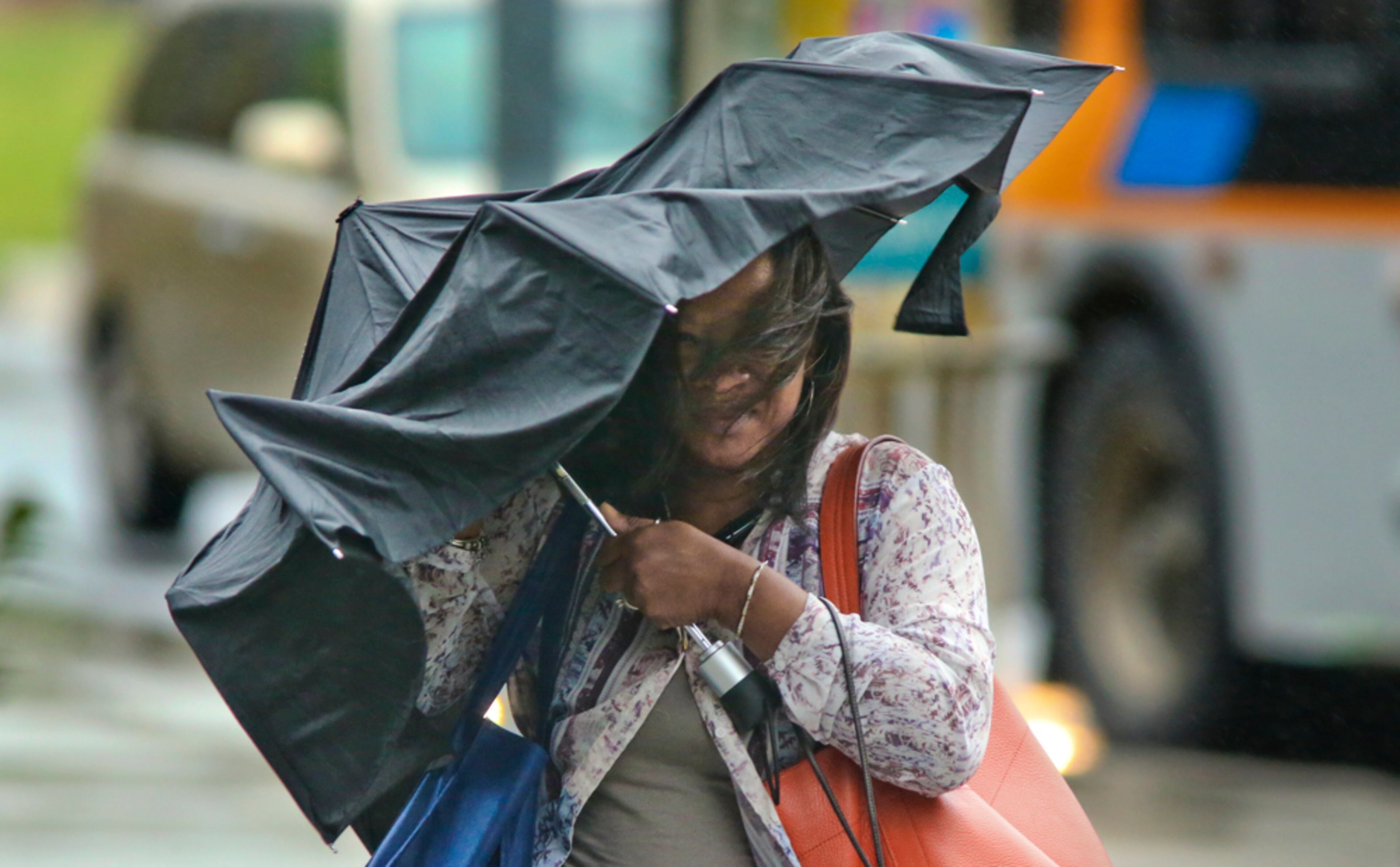 WINDY TUESDAY--April 15, 2014 Atlanta: Jaye Delery struggles with her umbrella against the wind near MARTA headquarters in the 2400 block of Piedmont Avenue as the Atlanta metro area was under a wind advisory from 8 a.m. to 10 p.m., with wind gusts up to 40 mph. The rain that soaked metro Atlanta overnight and into Tuesday morning, April 15, 2014 will usher in much colder temperatures by early Wednesday. Channel 2 meteorologist Karen Minton said lows early Wednesday will be around 33 degrees in town and in the upper 20s to low 30s in the suburbs. Afternoon highs Wednesday will be in the upper 50s, Minton said, followed by lows Wednesday night in the upper 30s. The Weather Service has also posted a freeze warning as far south as Macon, from midnight to 9 a.m. Wednesday. Forecast for the rest of the week: Skies will be sunny Wednesday and partly cloudy Thursday, and there's a 30 percent chance of rain Friday, Minton said. Highs will be in the mid-60s Thursday and Friday, with lows early Friday in the upper 40s. The weekend will begin with partly cloudy skies Saturday, with highs in the low 70s and lows around 50 degrees. JOHN SPINK/JSPINK@AJC.COM