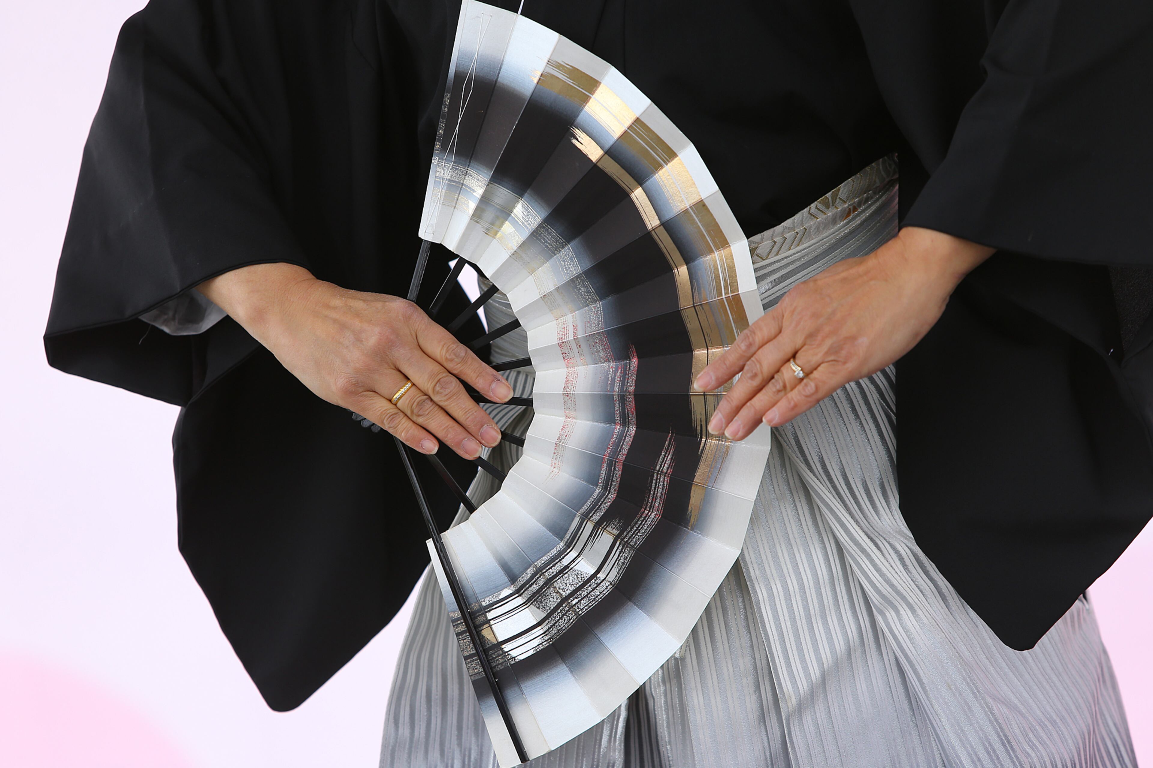 Kikue Chen, of the Kinuyo Shinobu Kai dance group, performs a traditional Japanese Cherry Blossum folk dance at the 33rd Annual Conyers Cherry Blossom Festival on Sunday, March 23, 2014, in Conyers.