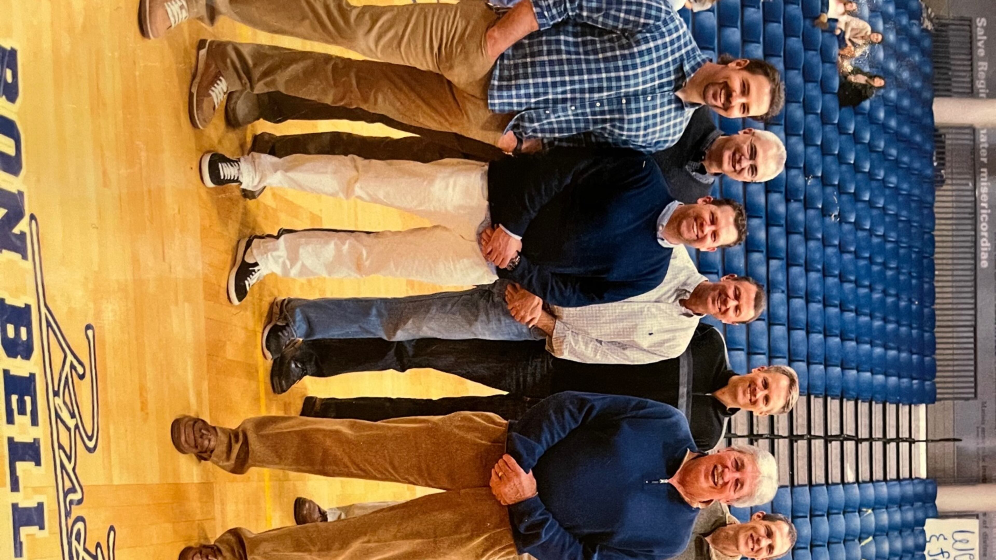 Marist coach Ron Bell is surrounded by his former players at the dedication of Ron Bell Court in 2016. (Photo courtesy of the Ron Bell family)