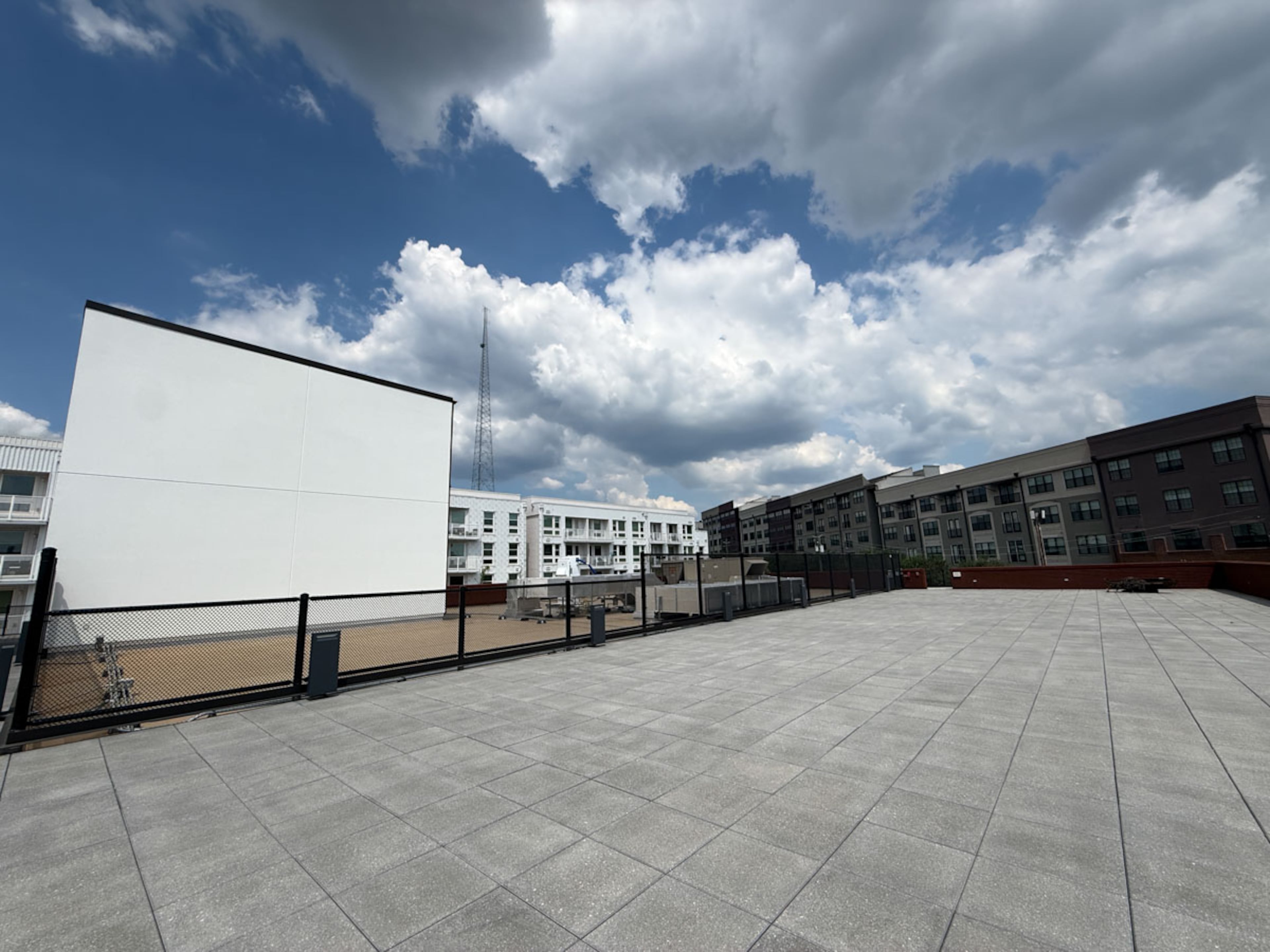 The rooftop of the new MOCA GA building, complete with an outdoor projection screen, looks out on the Goat Farm Arts Center. (Photo by Danielle Charbonneau)